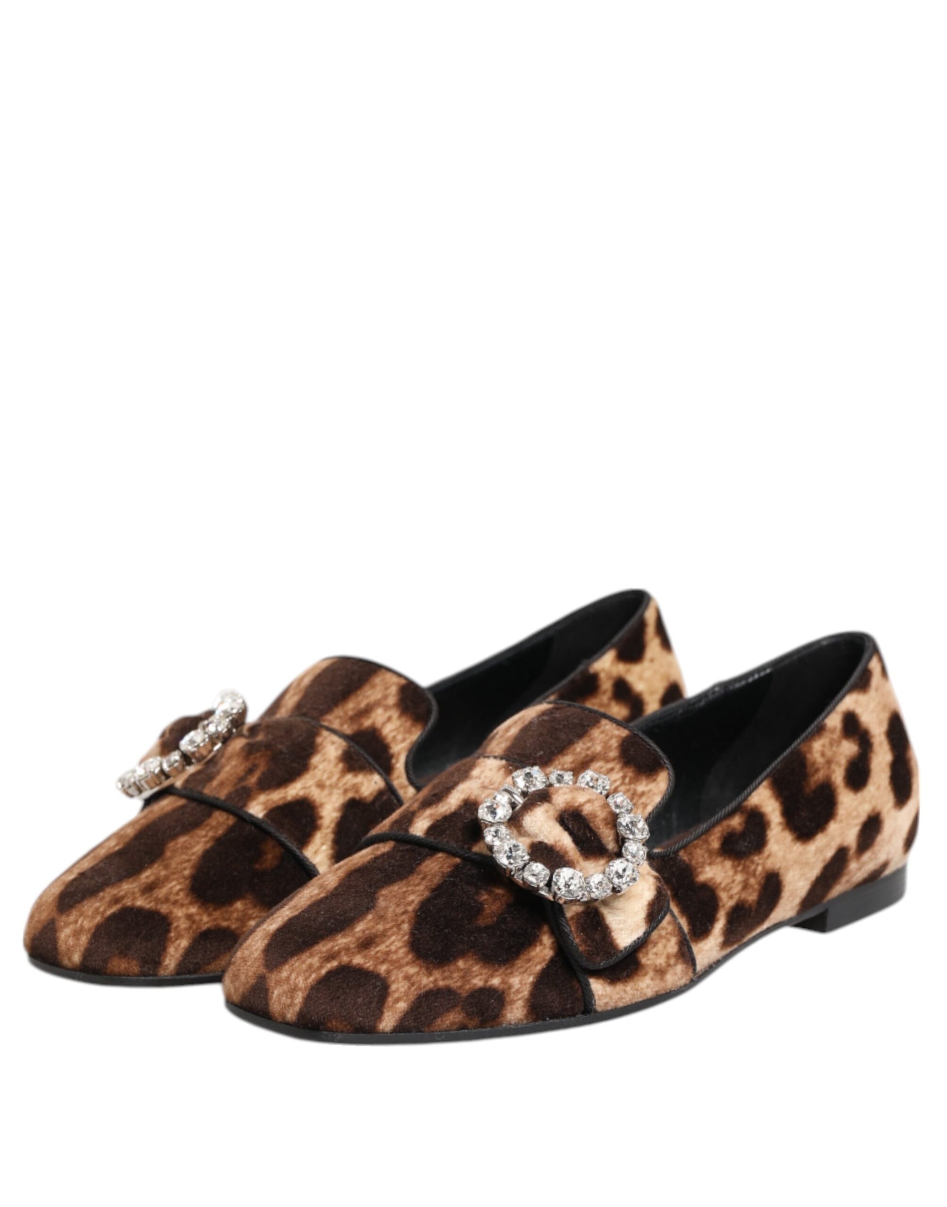 Pair of women's shoes with animal print design and rhinestone accents