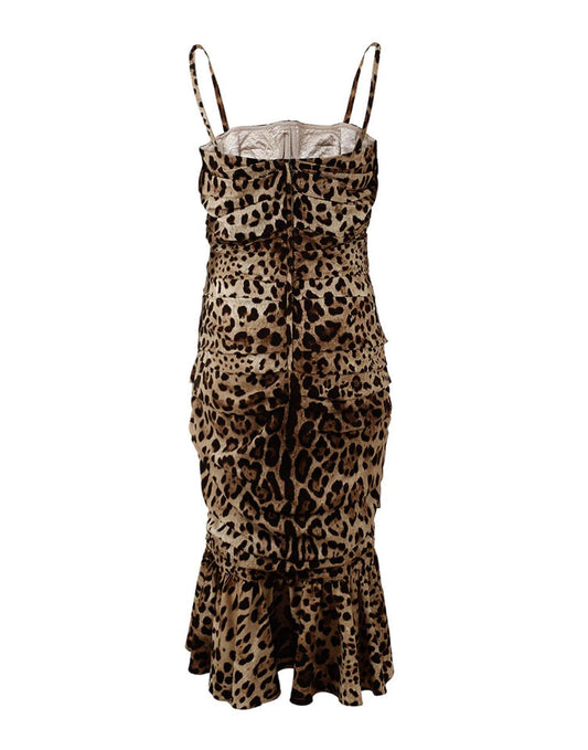 A brown leopard print midi dress with ruffled sleeves and hem, by Dolce & Gabbana