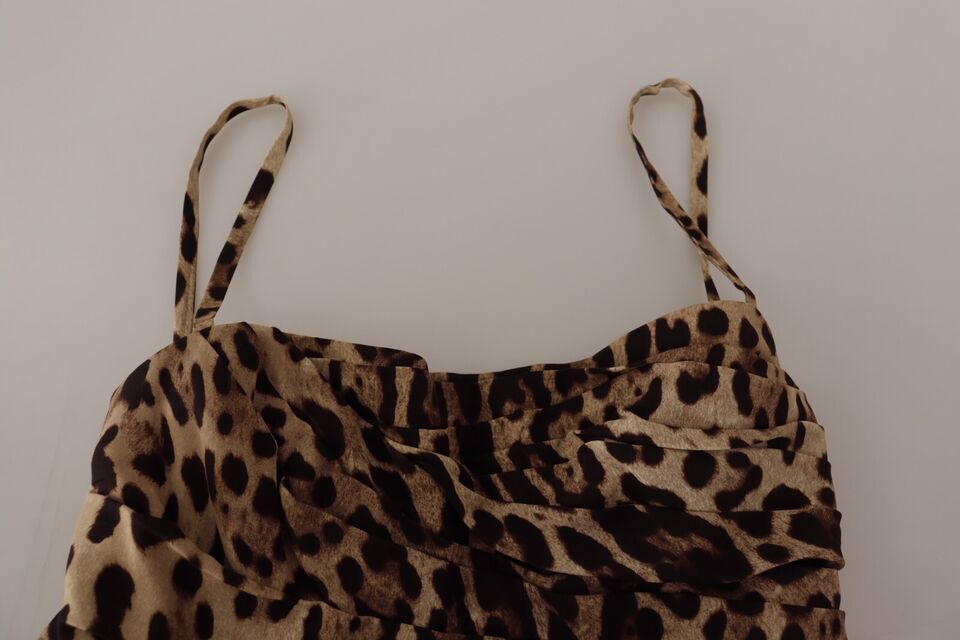 A brown leopard print midi dress with ruched detailing