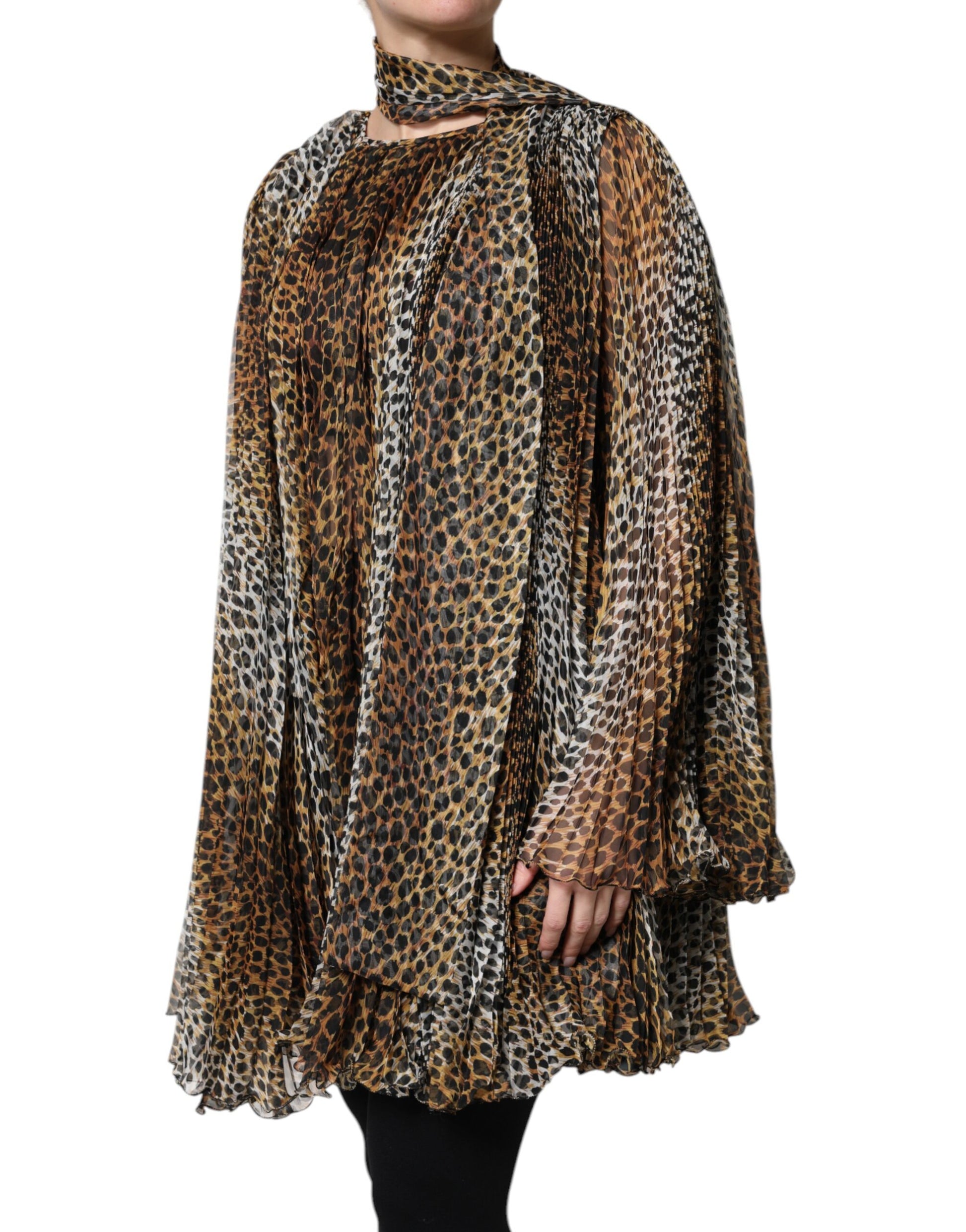 A woman wearing a brown leopard print scarf collared chiffon dress
