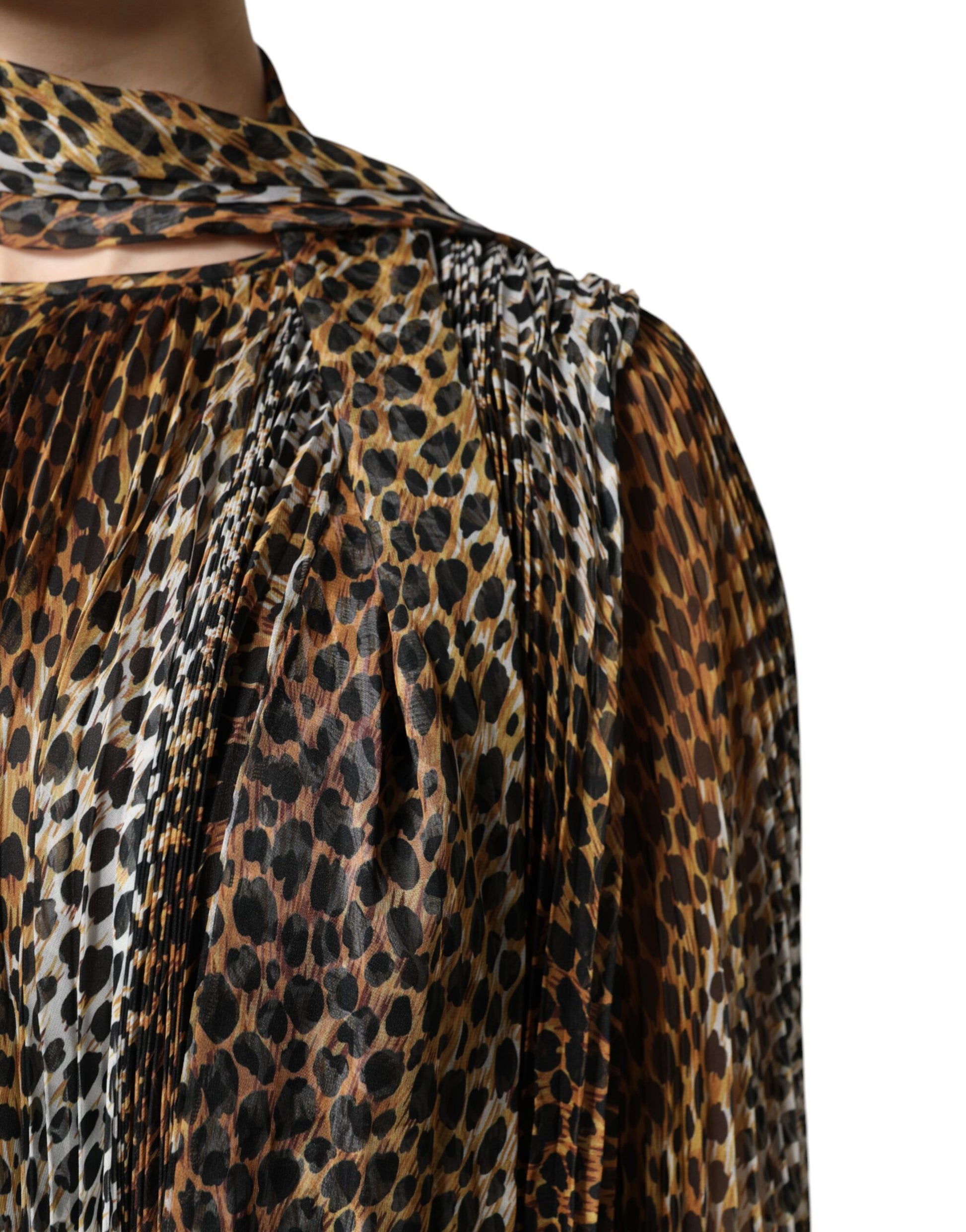 A brown leopard print scarf collared chiffon dress