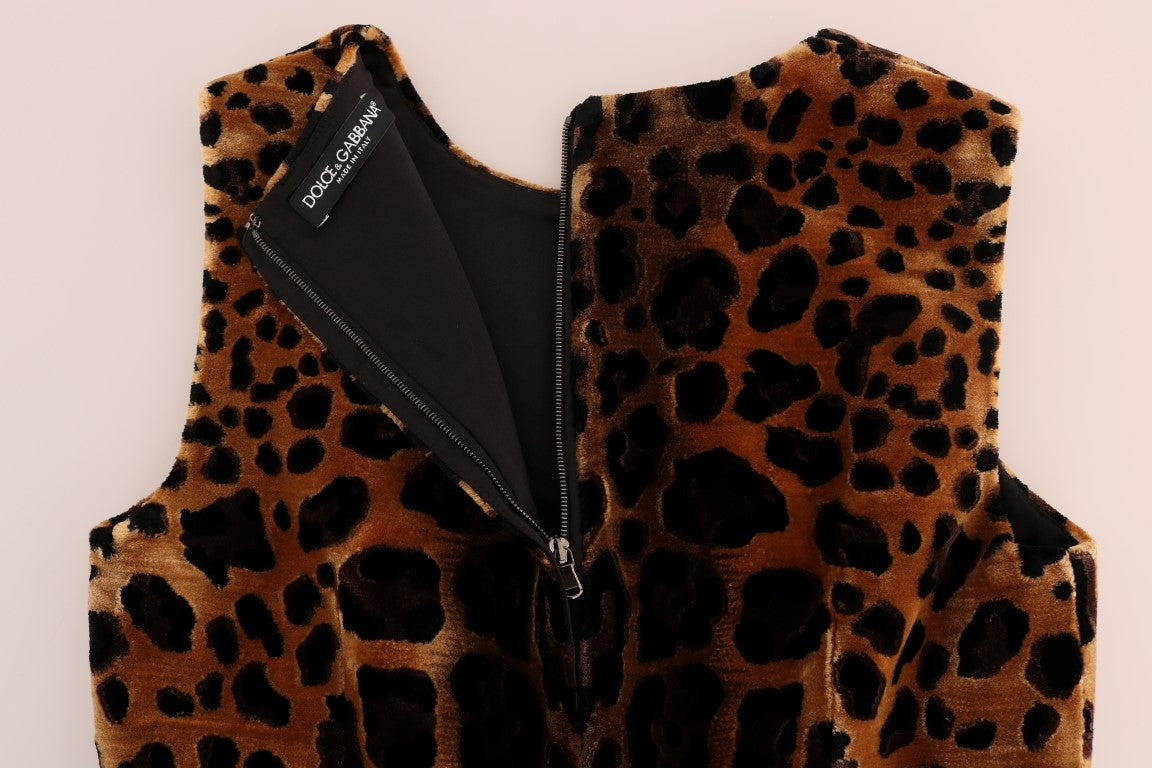 A brown leopard print silk sheath dress with a zipper in the front