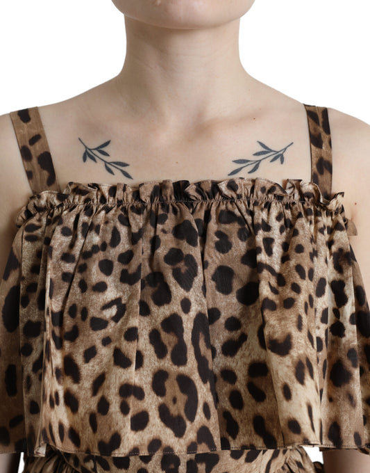Leopard print sleeveless dress with ruffled neckline and waistband