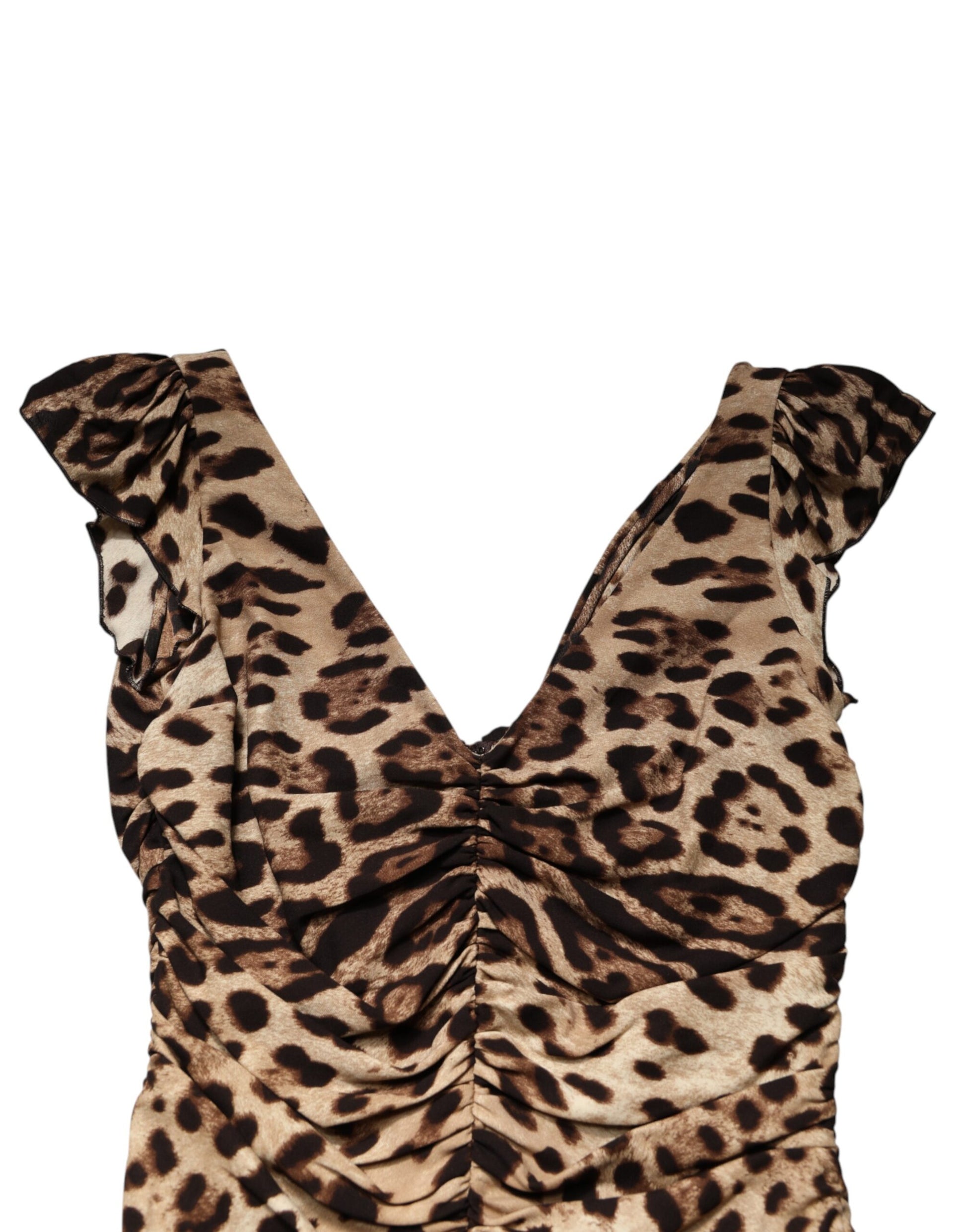A sleeveless midi dress with a brown leopard print design