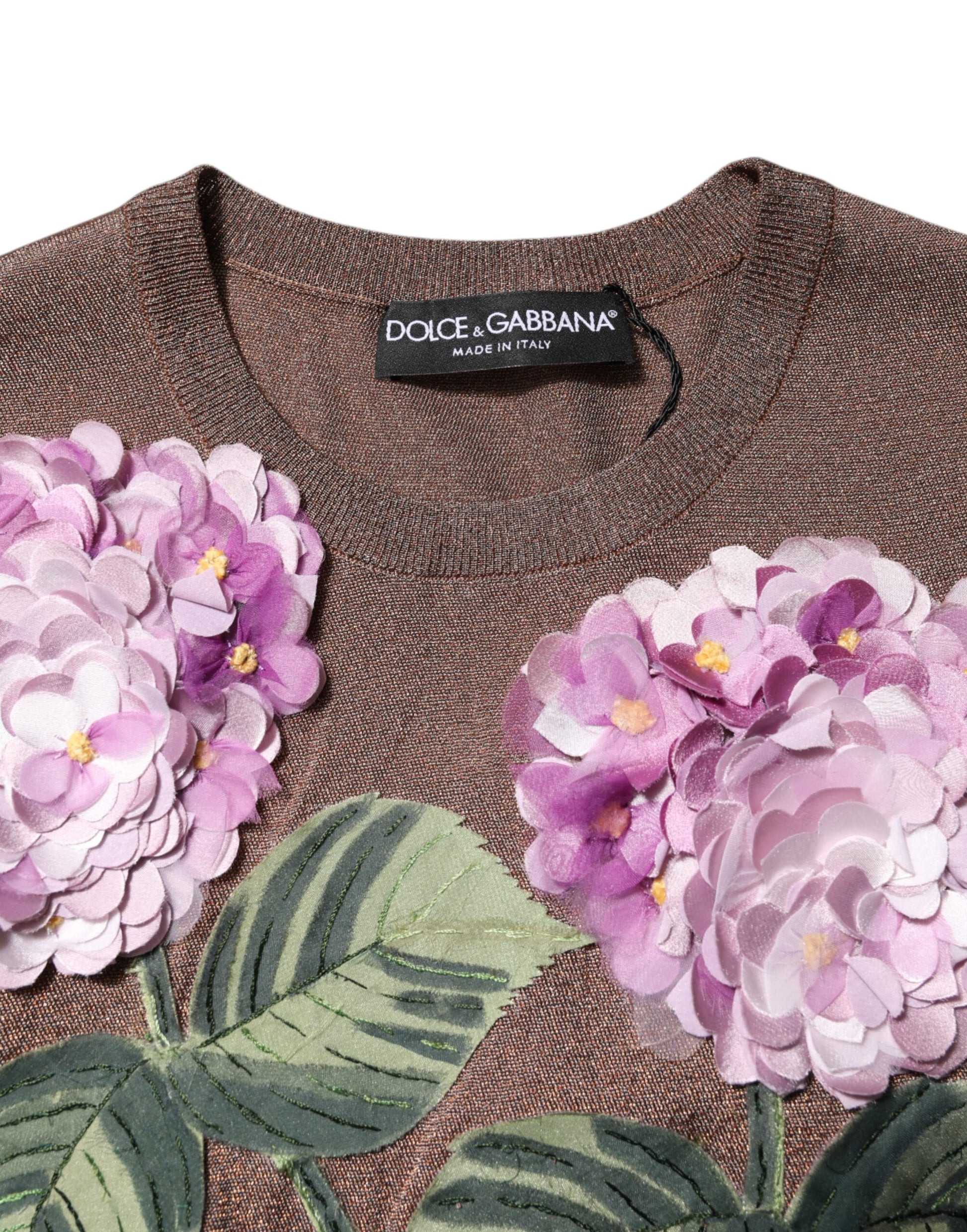 Brown sweater with purple flowers on front