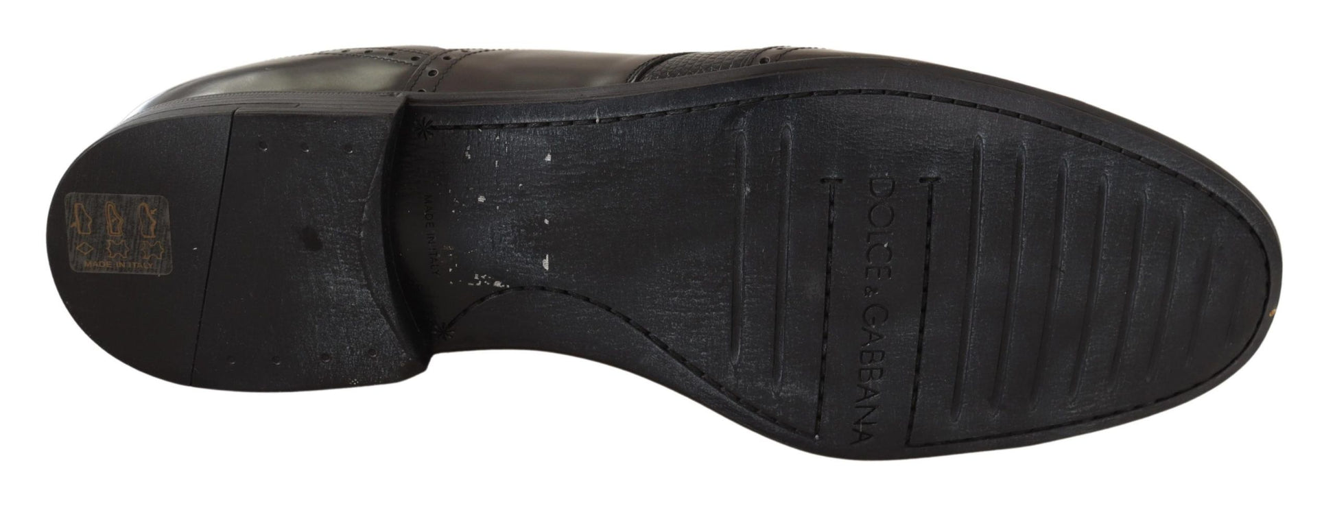 Black shoe with white sole and heel