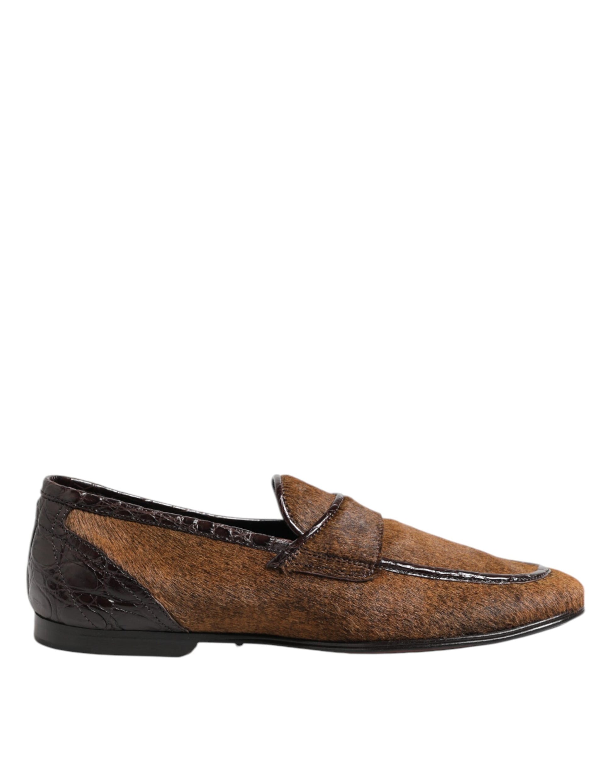 Brown leather loafer shoes with a slip-on design, featuring a distinctive stitched pattern on the side