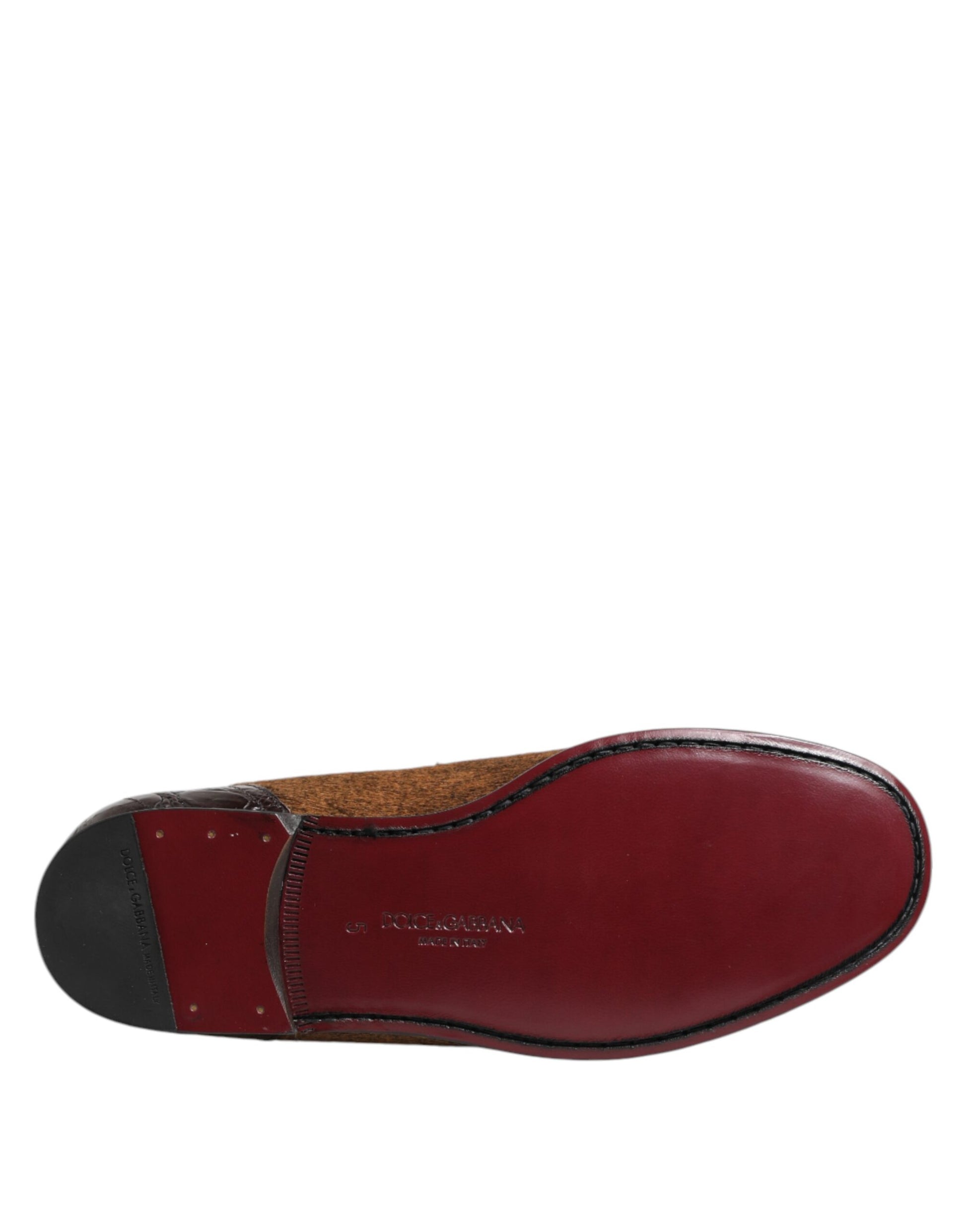 Red and brown loafer shoes with stitched details, leather material