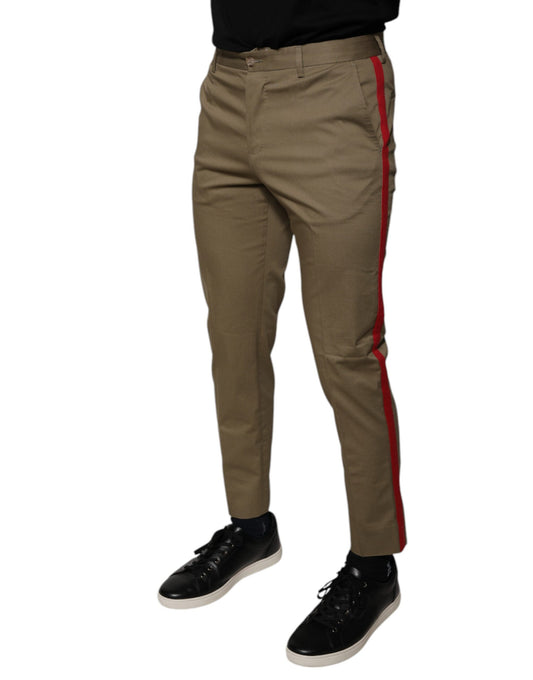 Pair of brown trousers with red stripe down side