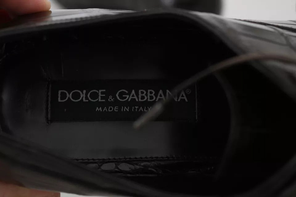 A pair of brown patterned leather dress shoes by Dolce & Gabbana