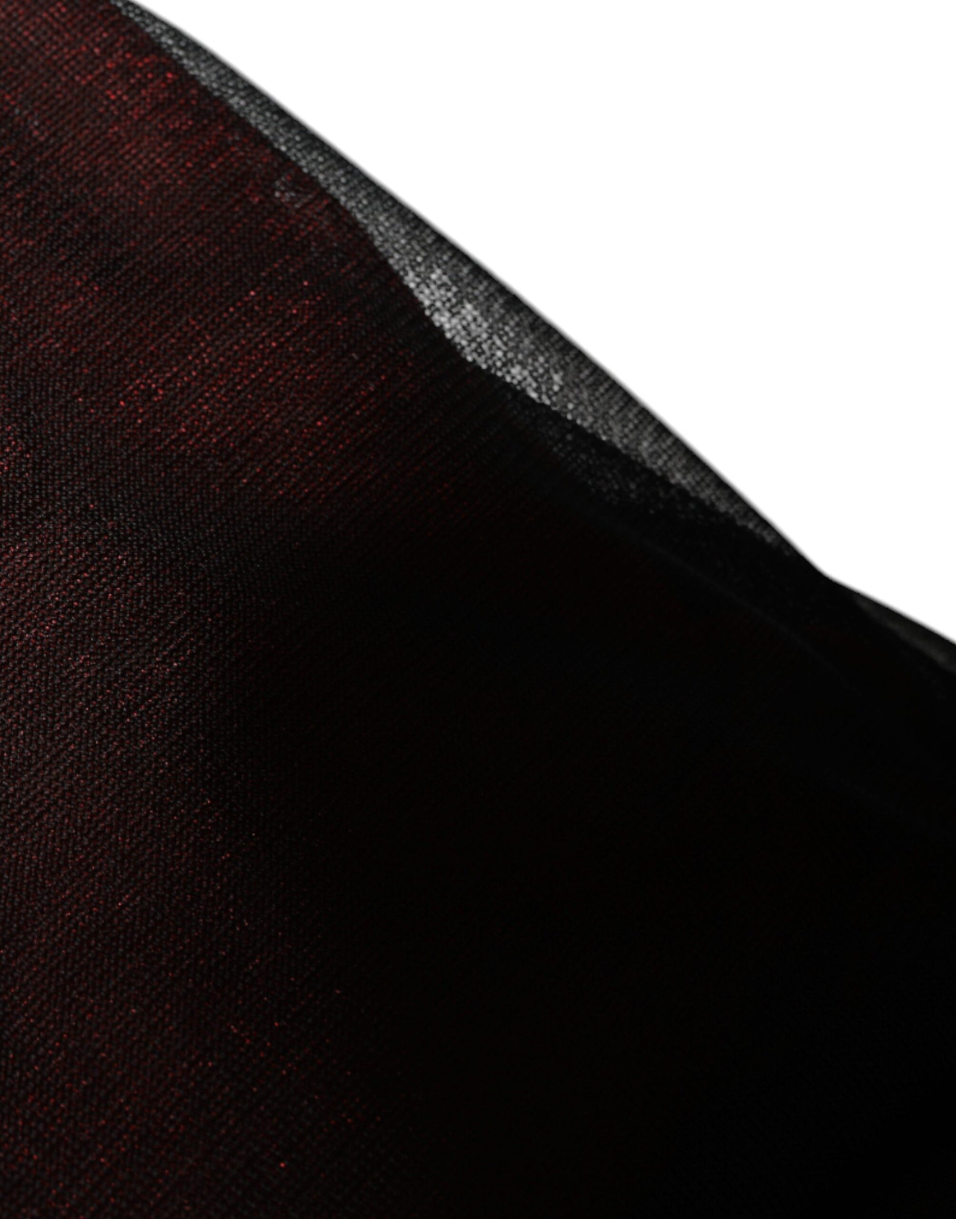 Black fabric with red glittery texture