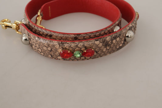 Two bracelets on a table. One is red and brown, the other is red and gold