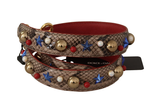 Decorative dog collar with snake skin pattern, gold bells, red stars, blue diamonds, and white pearls