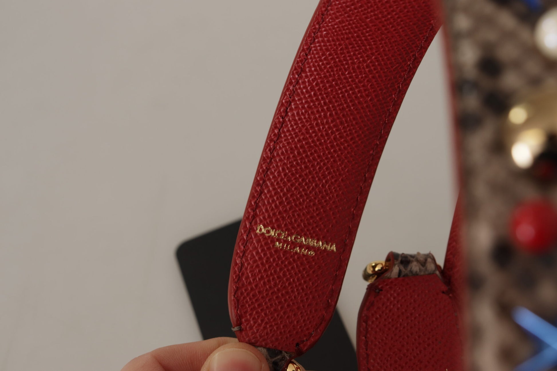 Red clutch purse with gold hardware