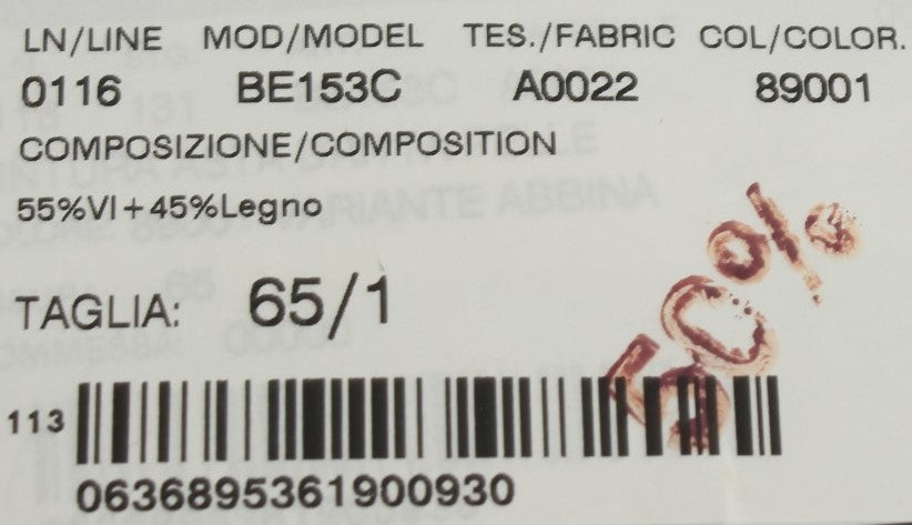 White label on fabric with black text and barcode