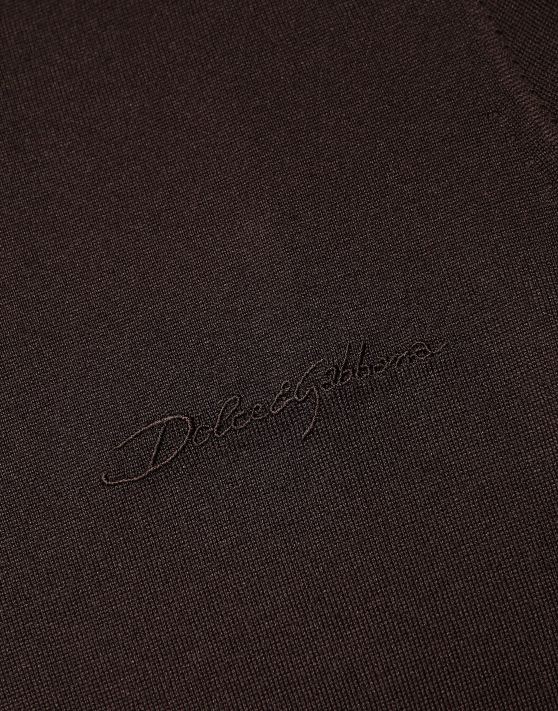 Dark fabric with embroidered logo