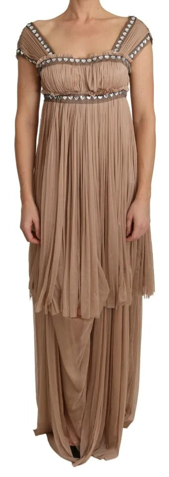 A long, sleeveless dress with ruffled detailing and a shift silhouette