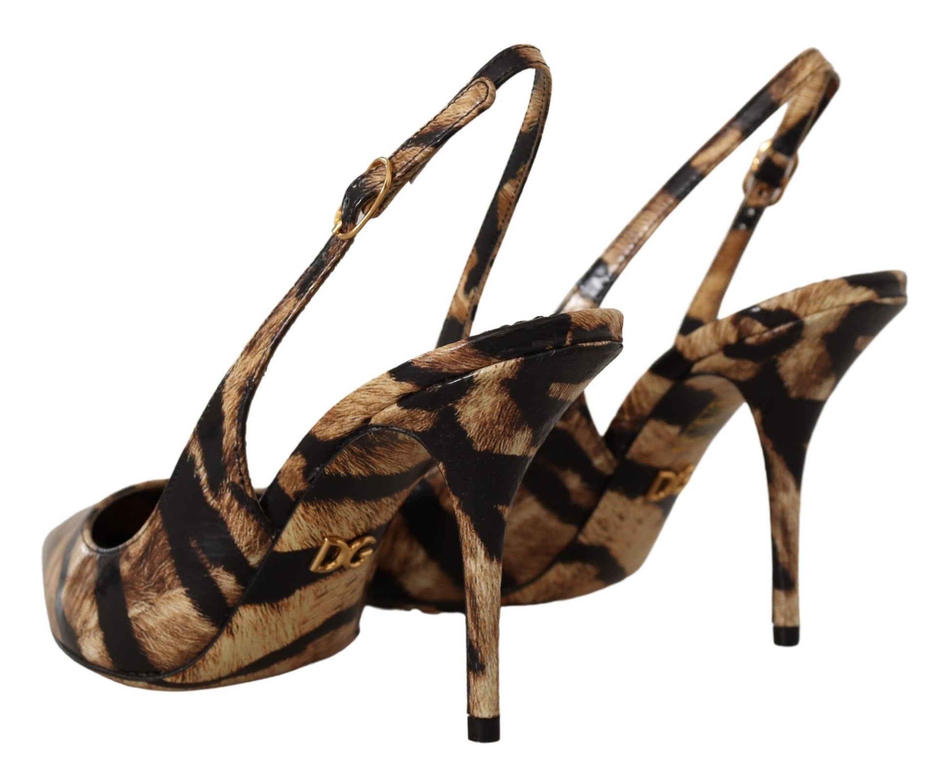 Pair of women's high heel shoes with animal print design and gold accents