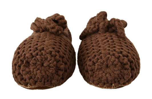 Pair of brown crocheted slippers with ties on top