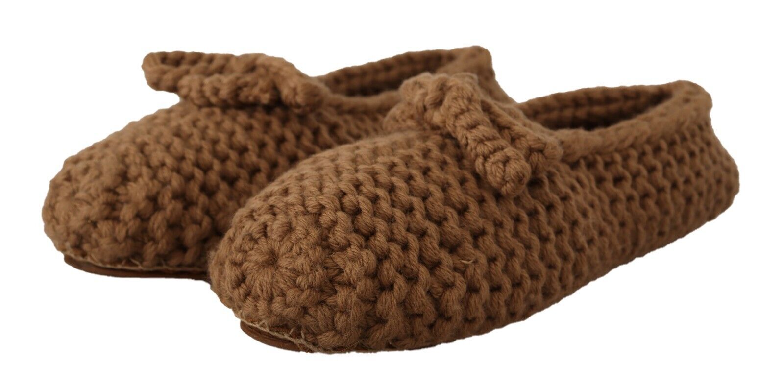 Pair of brown slippers with texture on soles