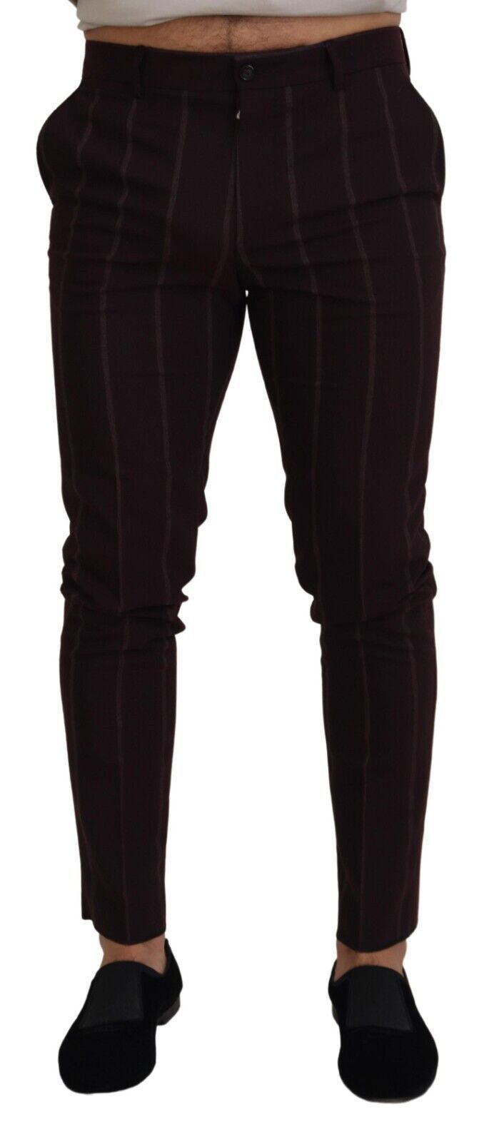 Pair of brown trousers with a checkered pattern on the legs