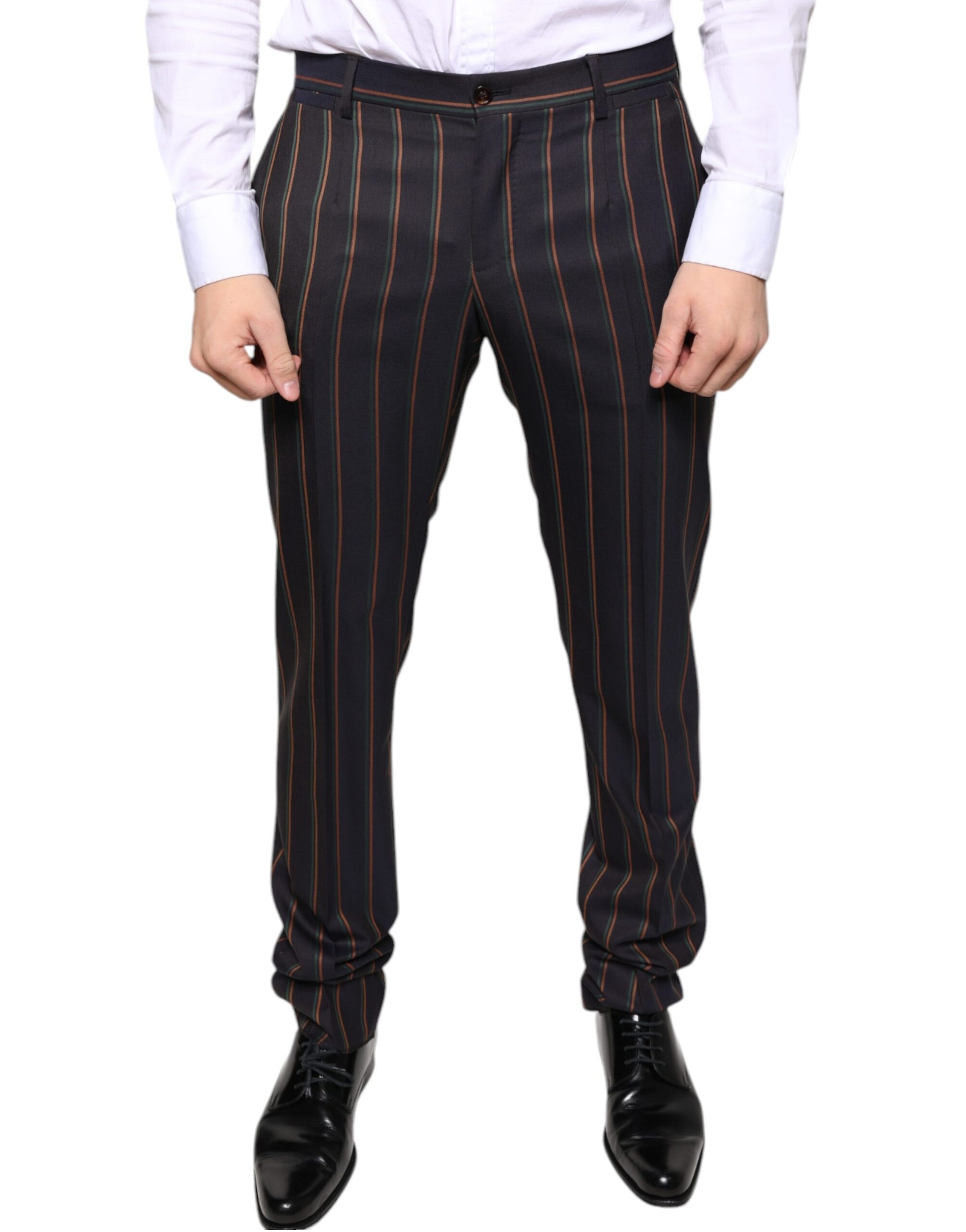 A pair of men's dress pants with brown stripes on the sides. They are designed by Dolce & Gabbana and appear