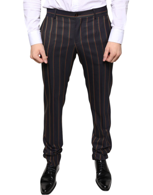 A pair of men's dress pants with brown stripes on the sides. They are designed by Dolce & Gabbana and appear