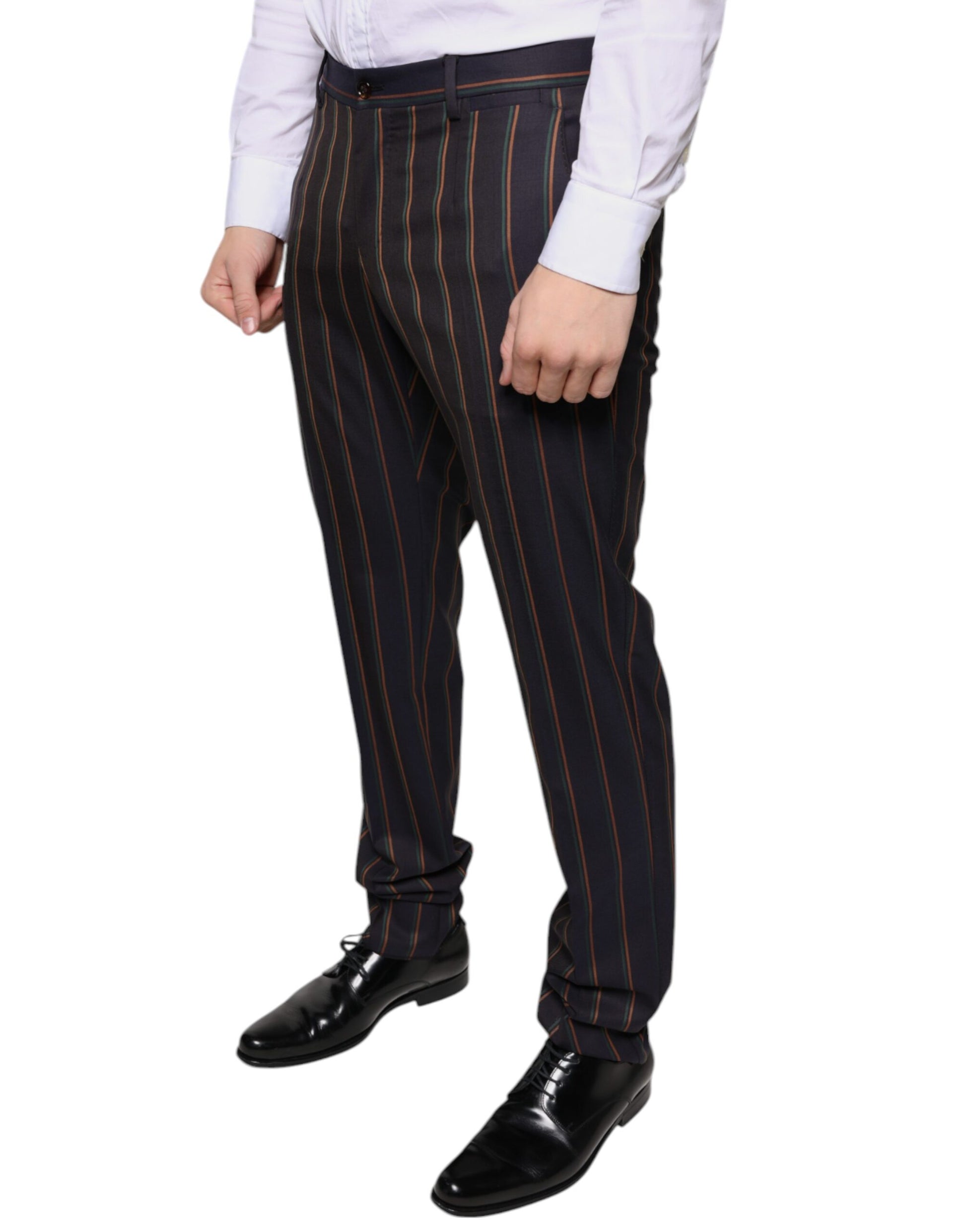 A pair of men's dress pants with brown stripes on the side. They are designed by Dolce & Gabbana and appear t