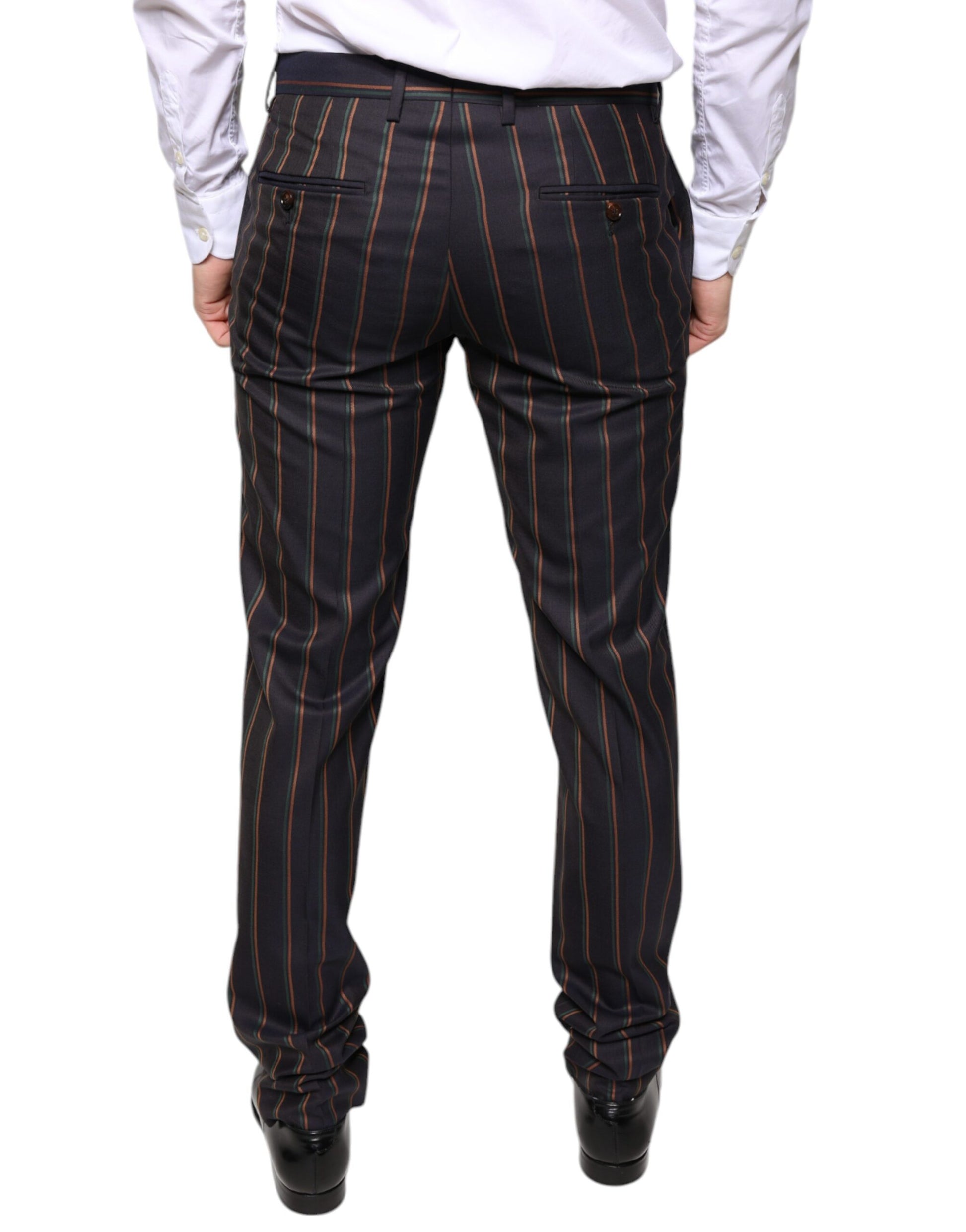 A pair of men's dress pants with brown stripes, designed by Dolce & Gabbana. They are skinny fit trousers