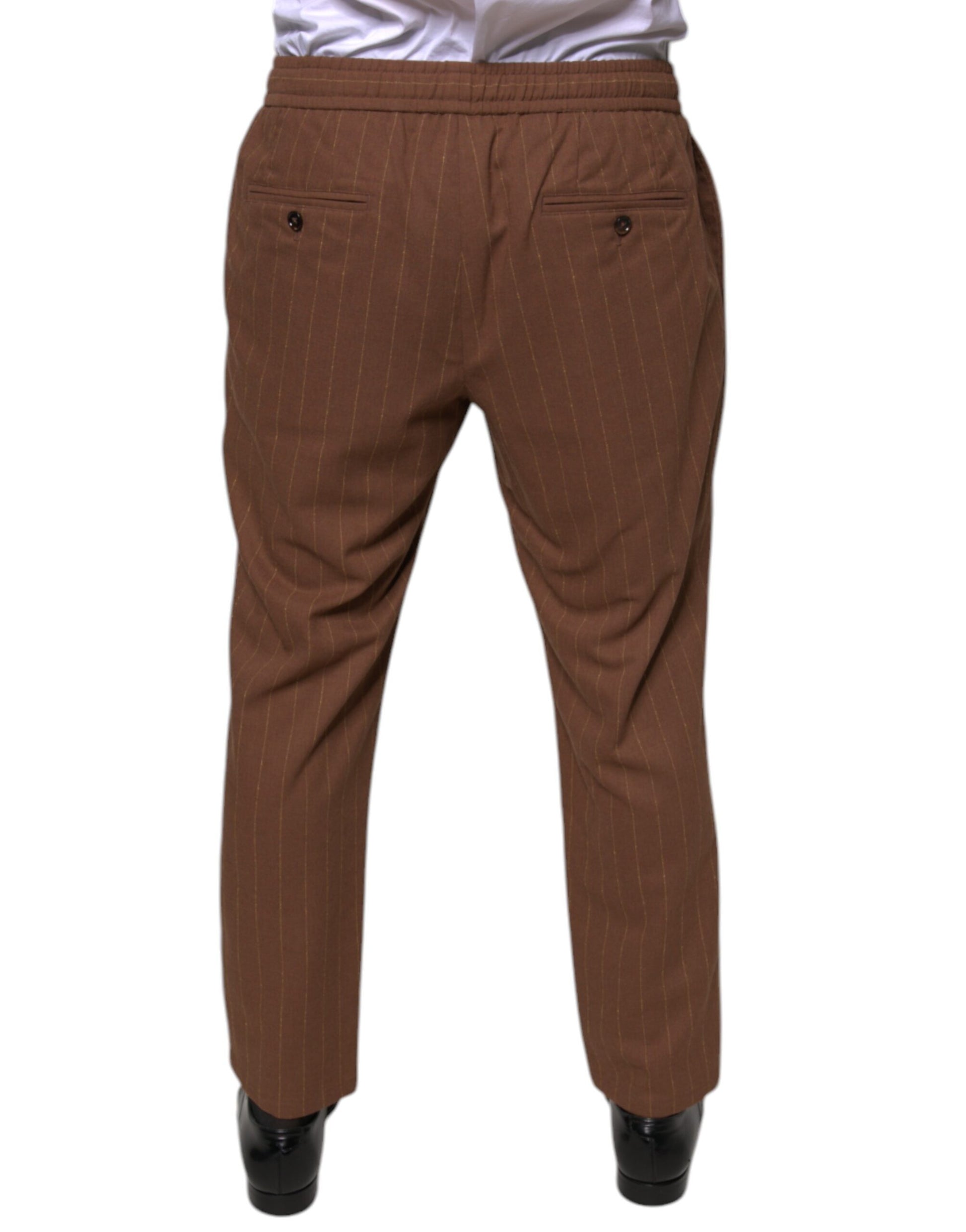 A pair of brown striped men's dress pants by Dolce & Gabbana