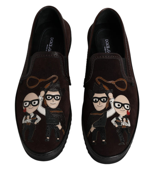 Pair of brown loafers with cartoon character designs on them