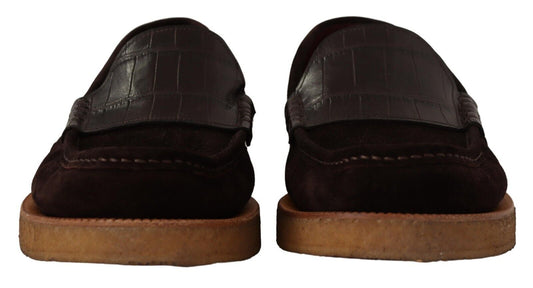 Pair of brown leather shoes with tan soles