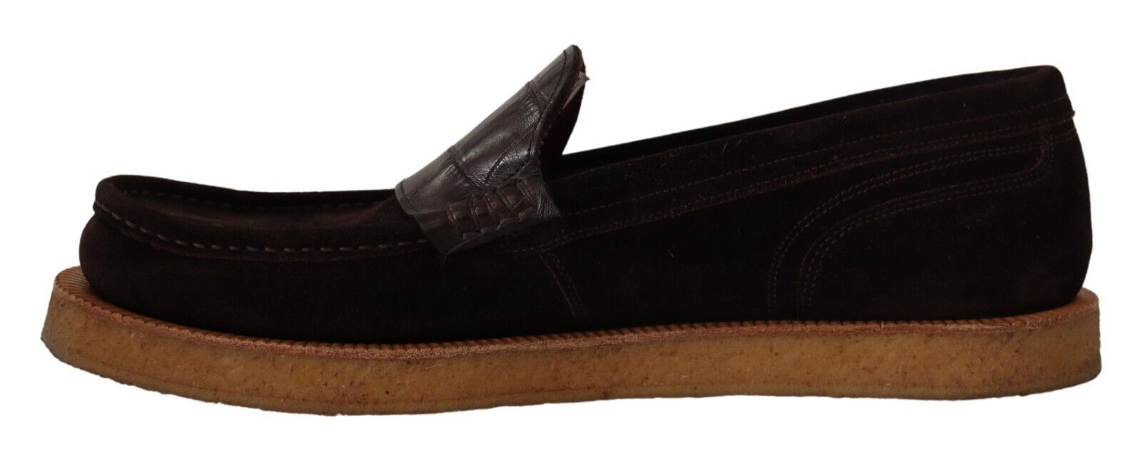 Pair of black and brown shoes with a strap across the top
