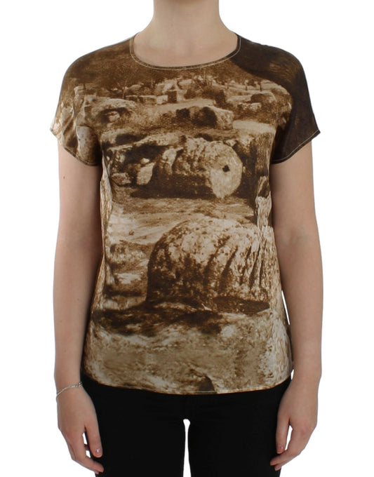 Brown shirt with a printed scene on it