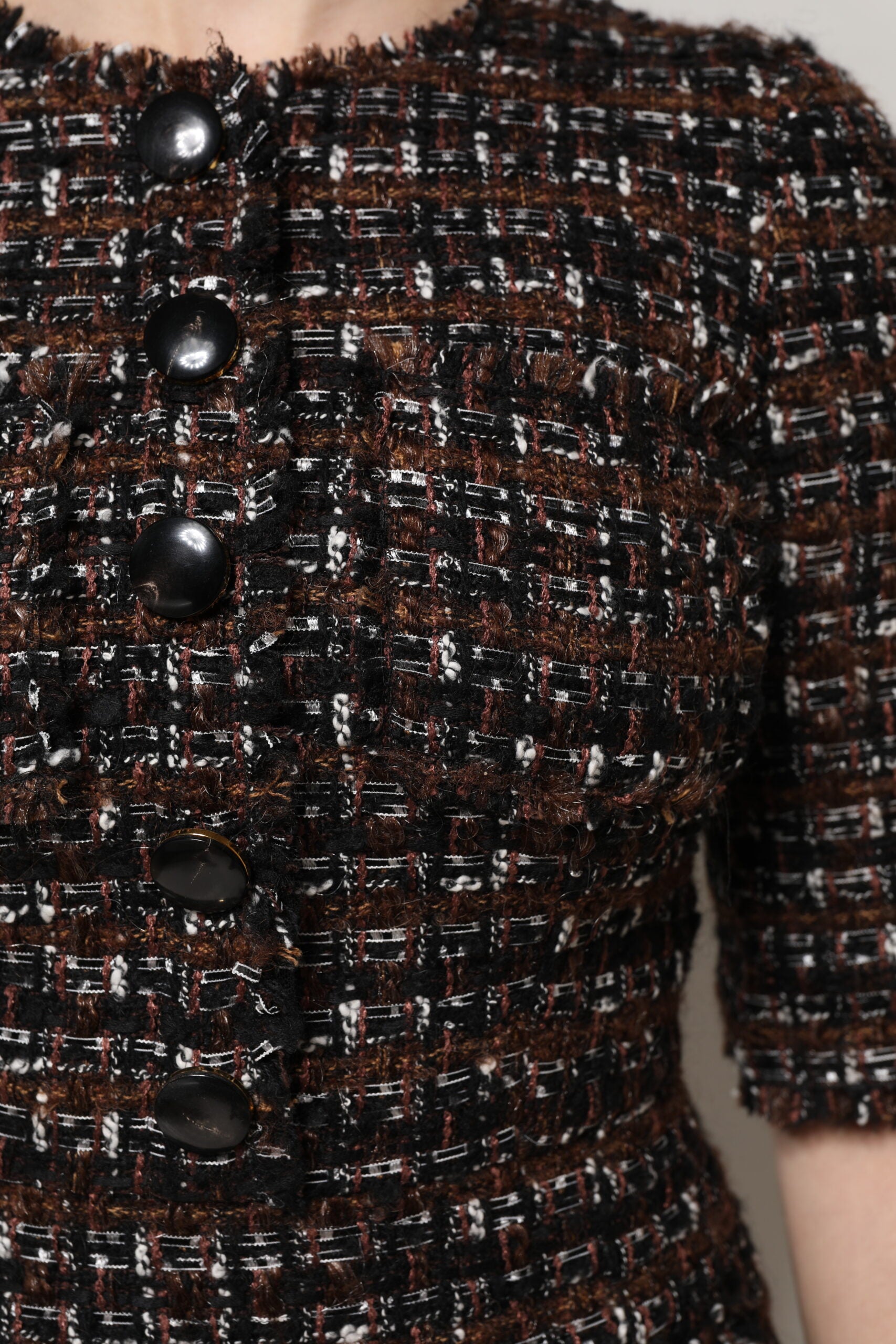 Black and brown tweed jacket with black buttons