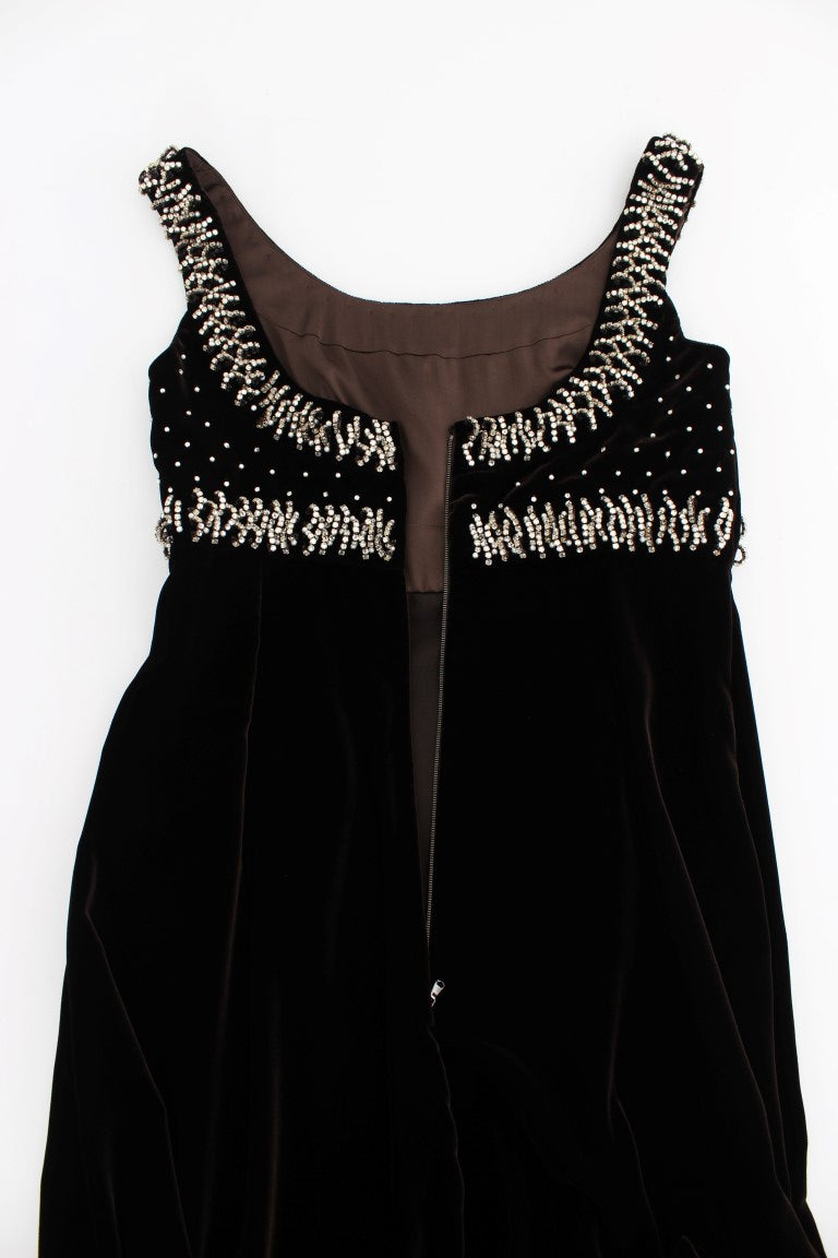 Black velvet dress with embellishments on bodice