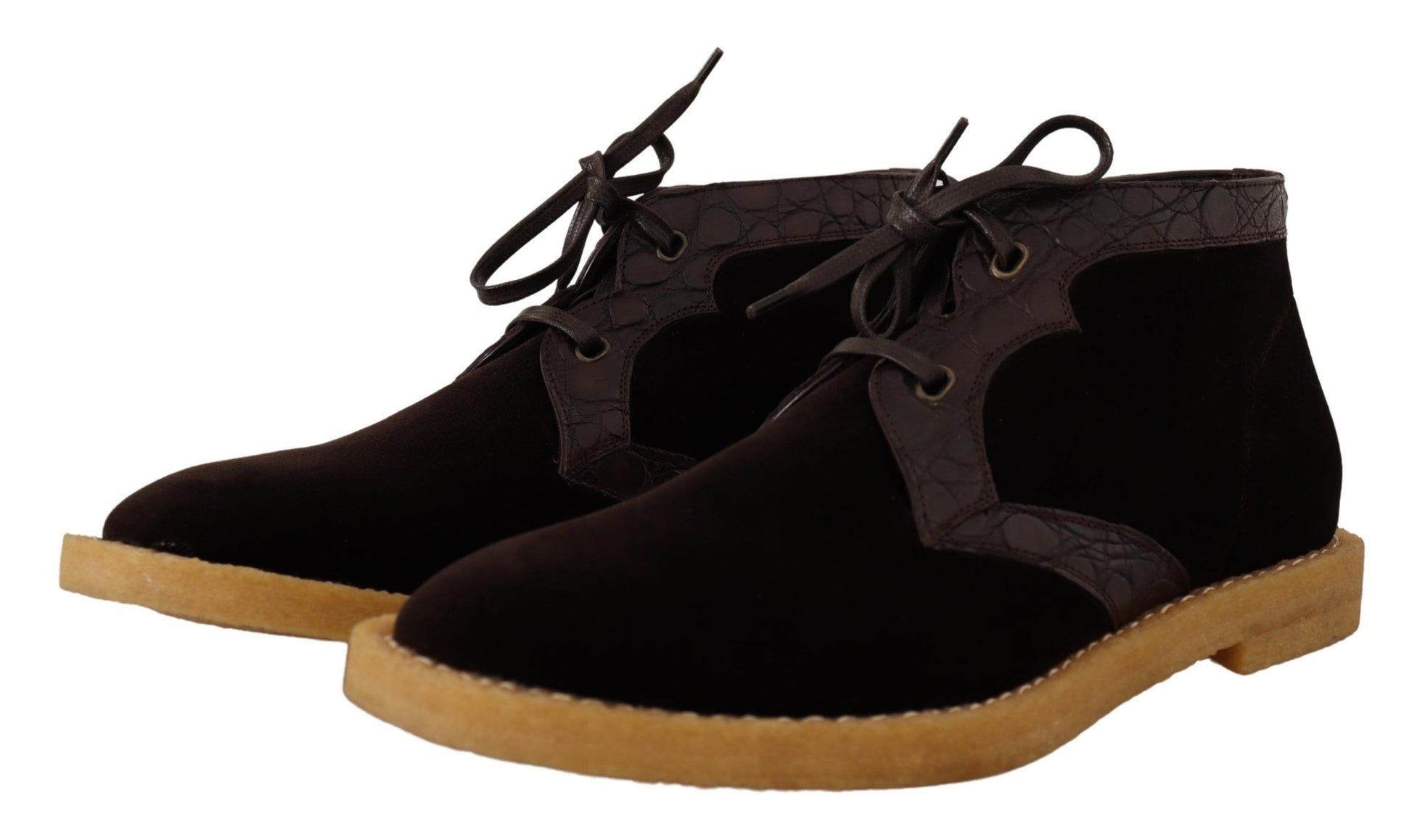 Pair of brown suede boots with laces and a wooden sole