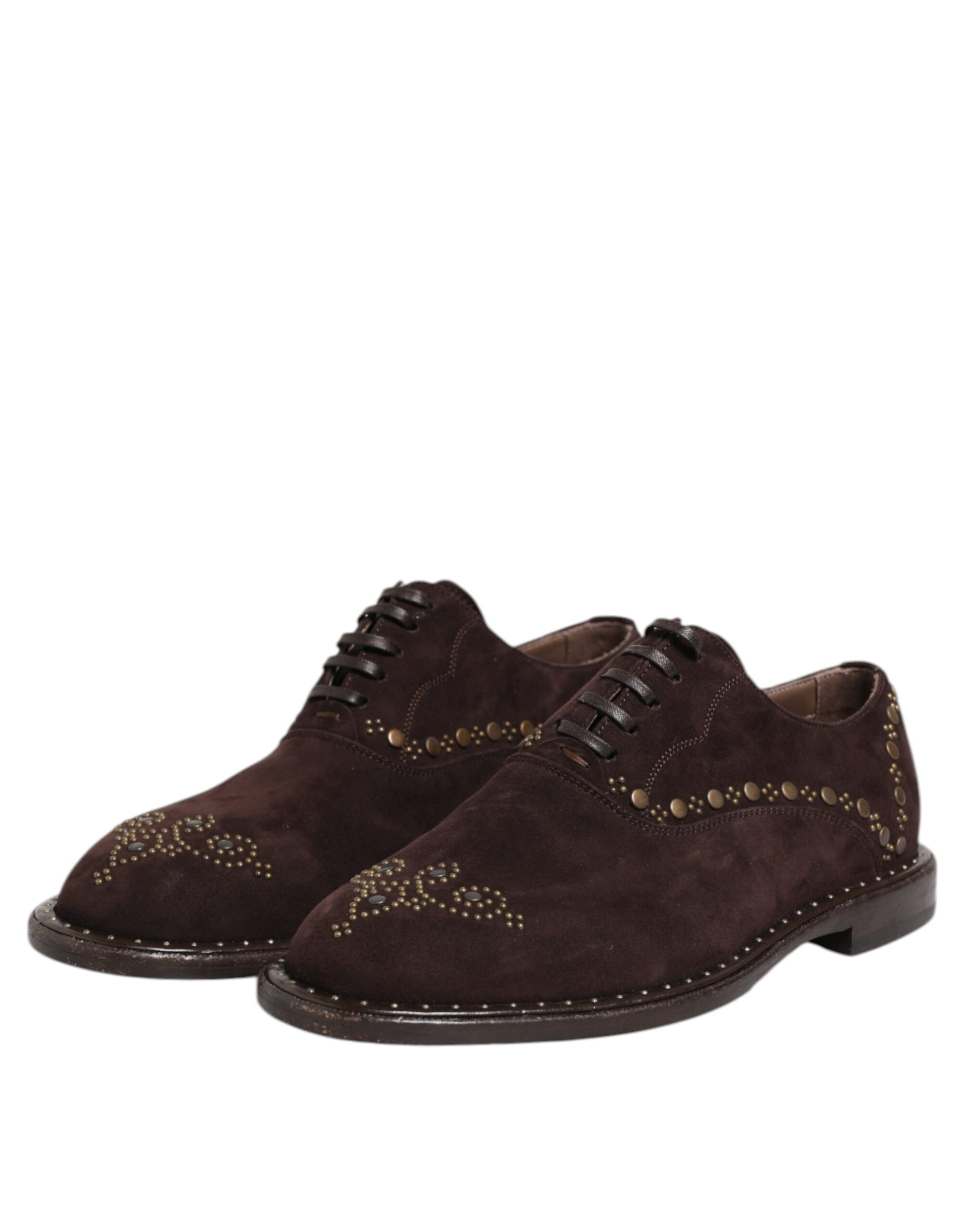 Pair of brown velvet lace up dress shoes with gold embroidery and black soles