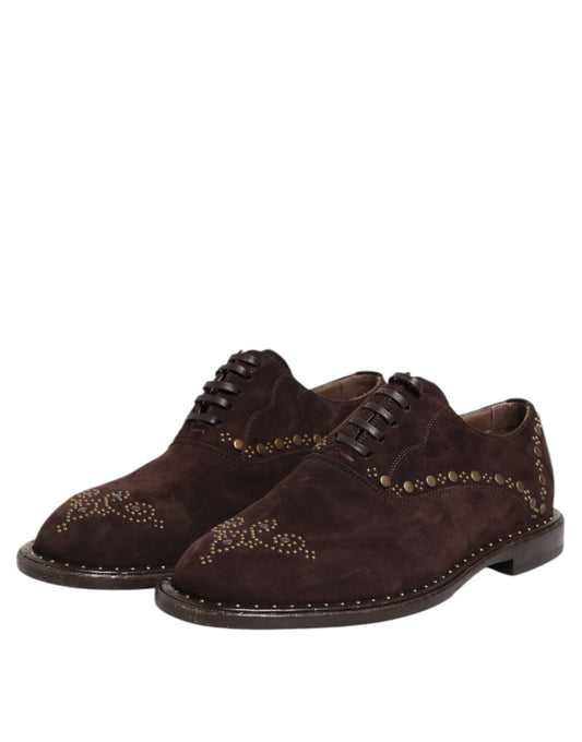 Pair of brown velvet lace up dress shoes with gold embroidery and black soles