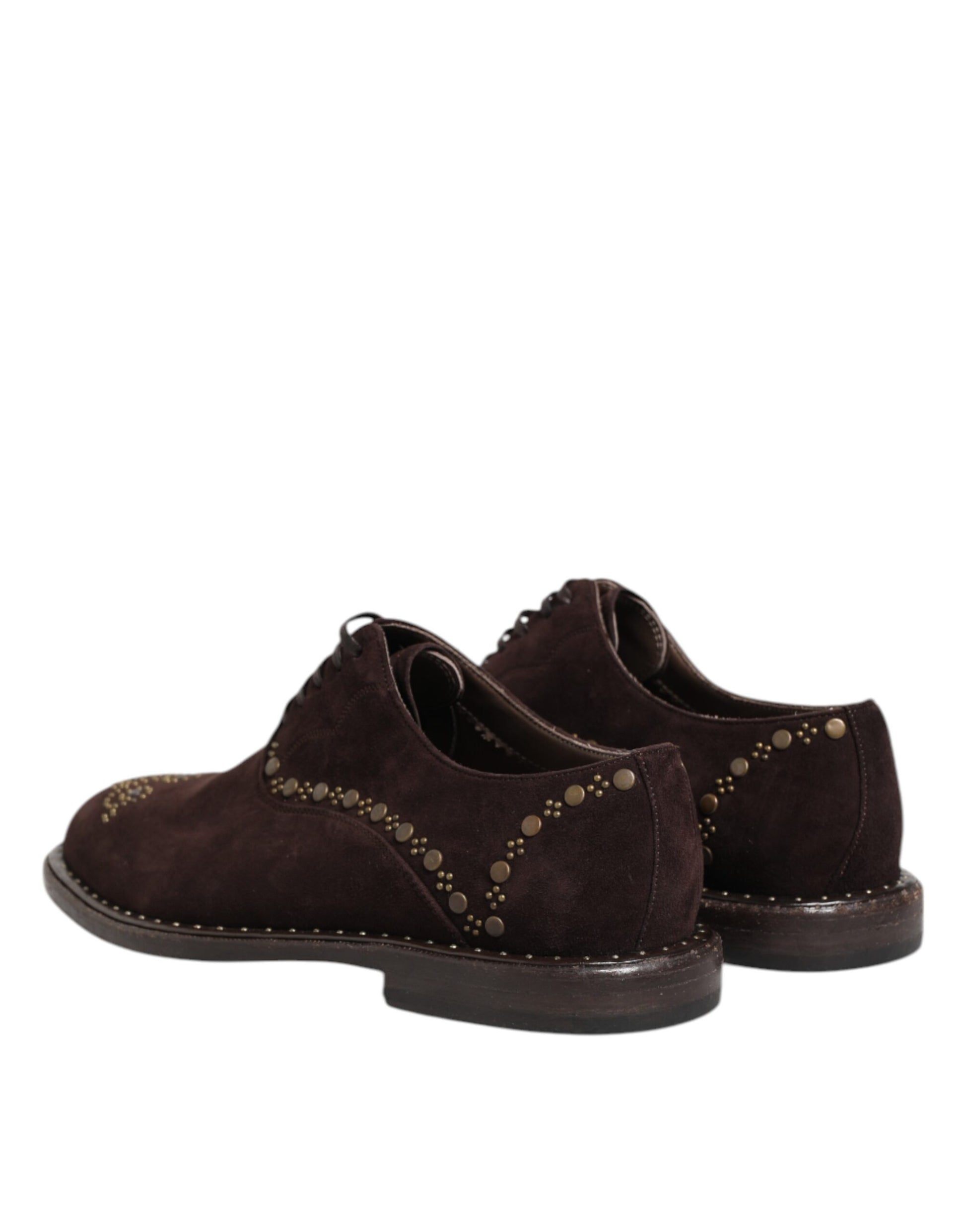 Pair of brown velvet lace-up dress shoes with gold studs and a chunky heel