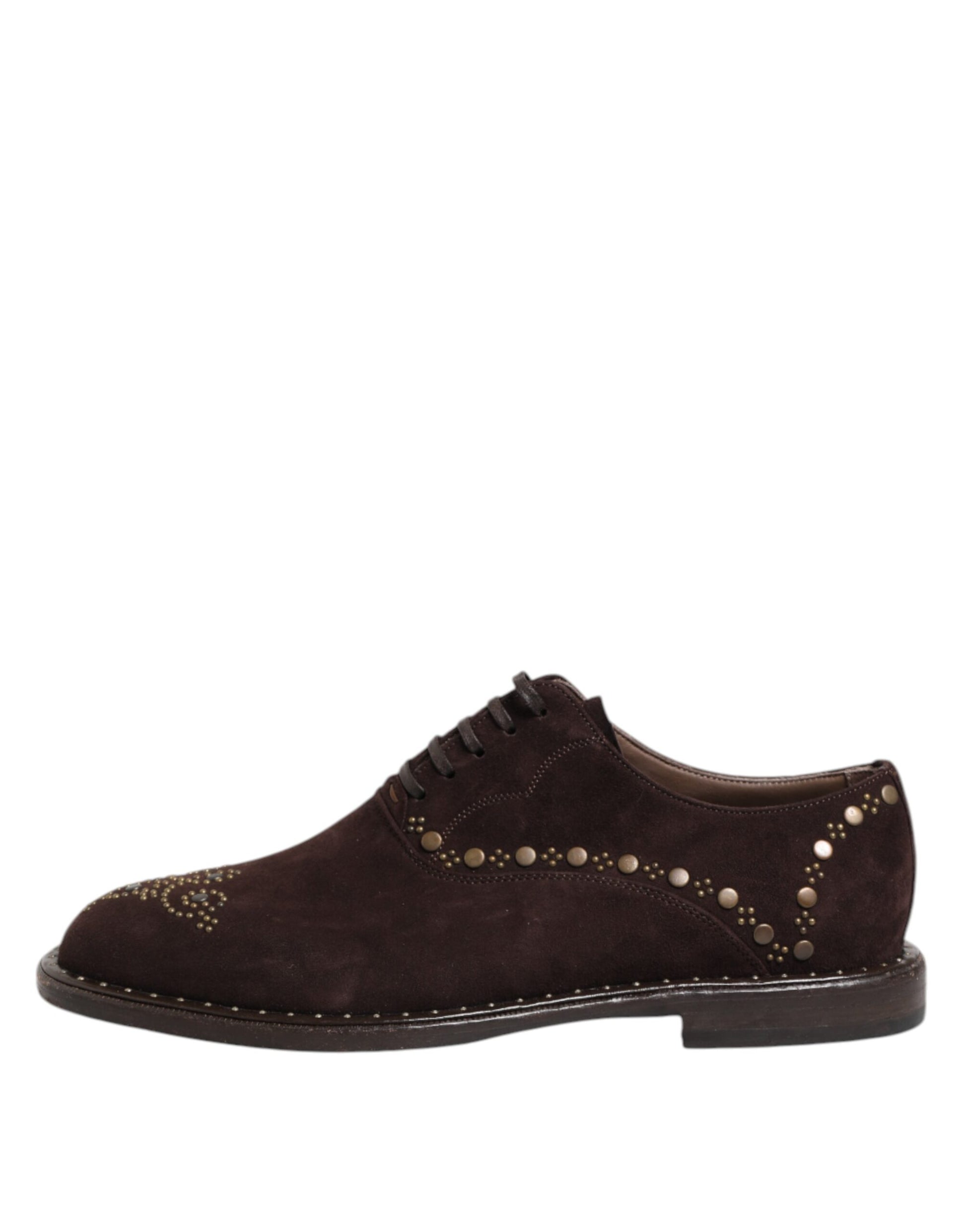 A pair of brown velvet lace up oxford dress shoes with gold studs on the side