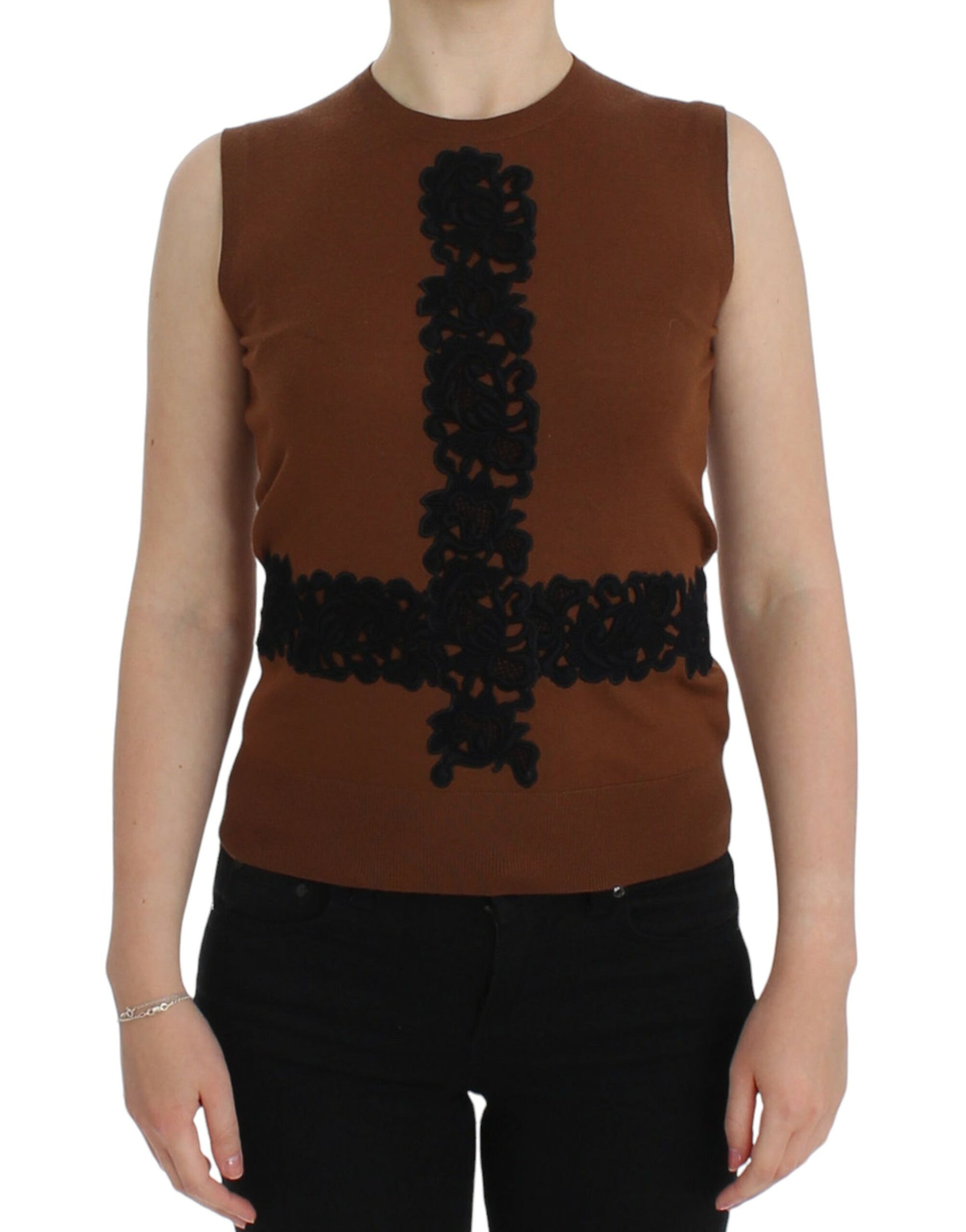 Brown vest with embroidered cross design on front