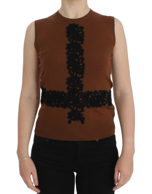 Brown vest with embroidered cross design on front