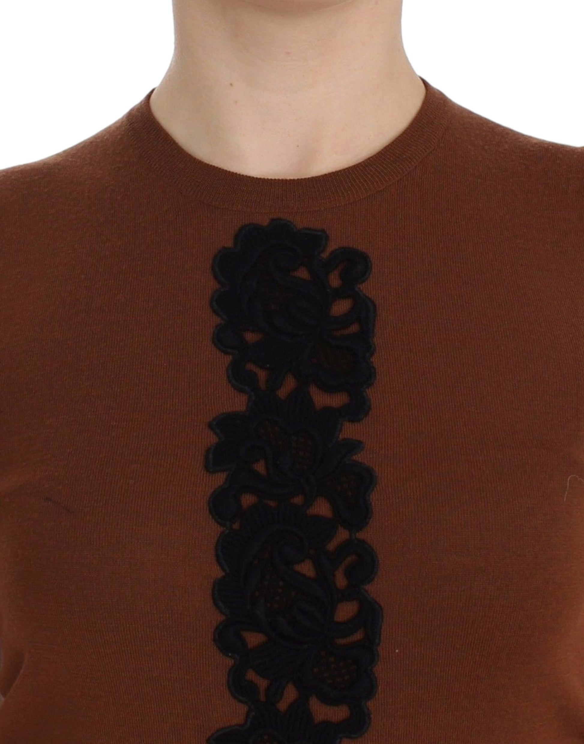 Brown sweater with black lace detailing on front