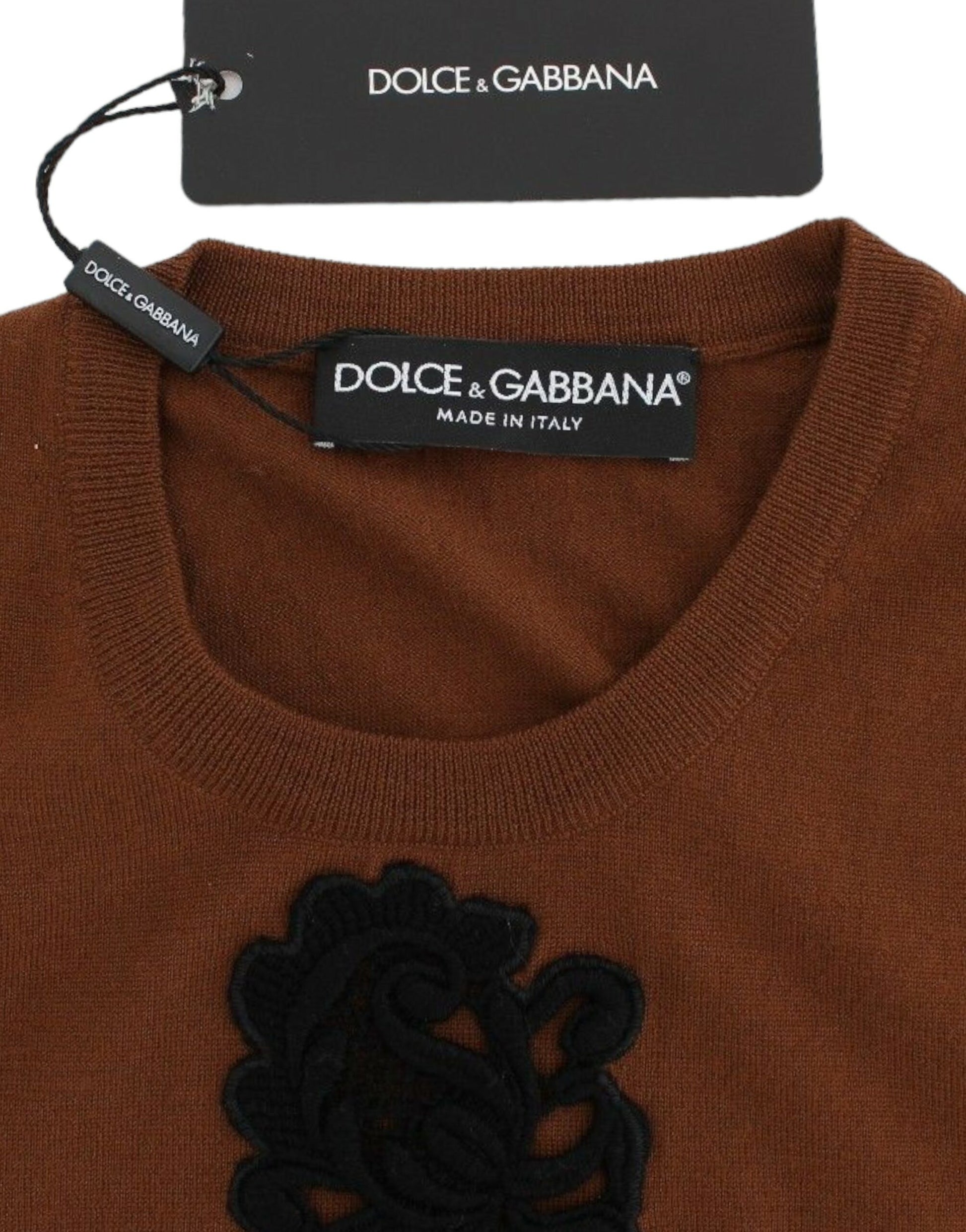 Brown sweater with black label