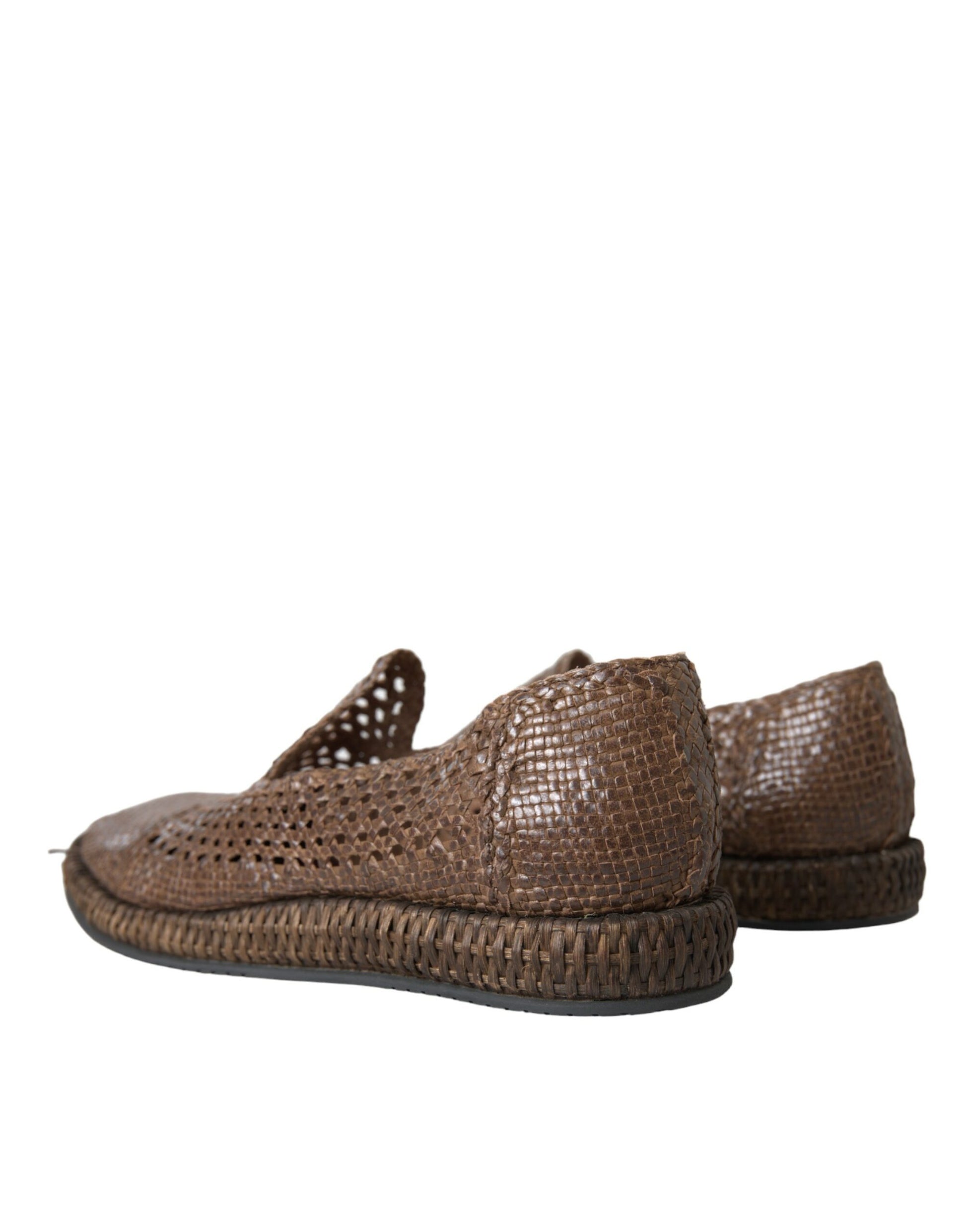Pair of brown woven shoes with black soles and laces