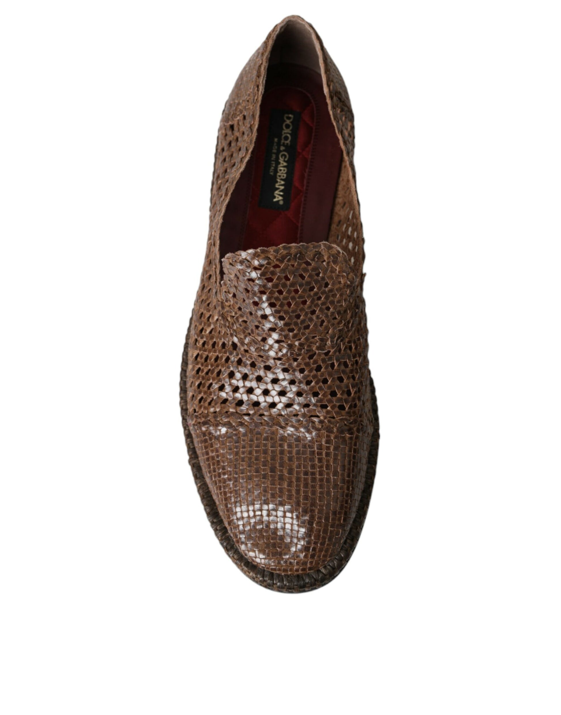 Brown loafer shoe with embossed design on vamp and heel