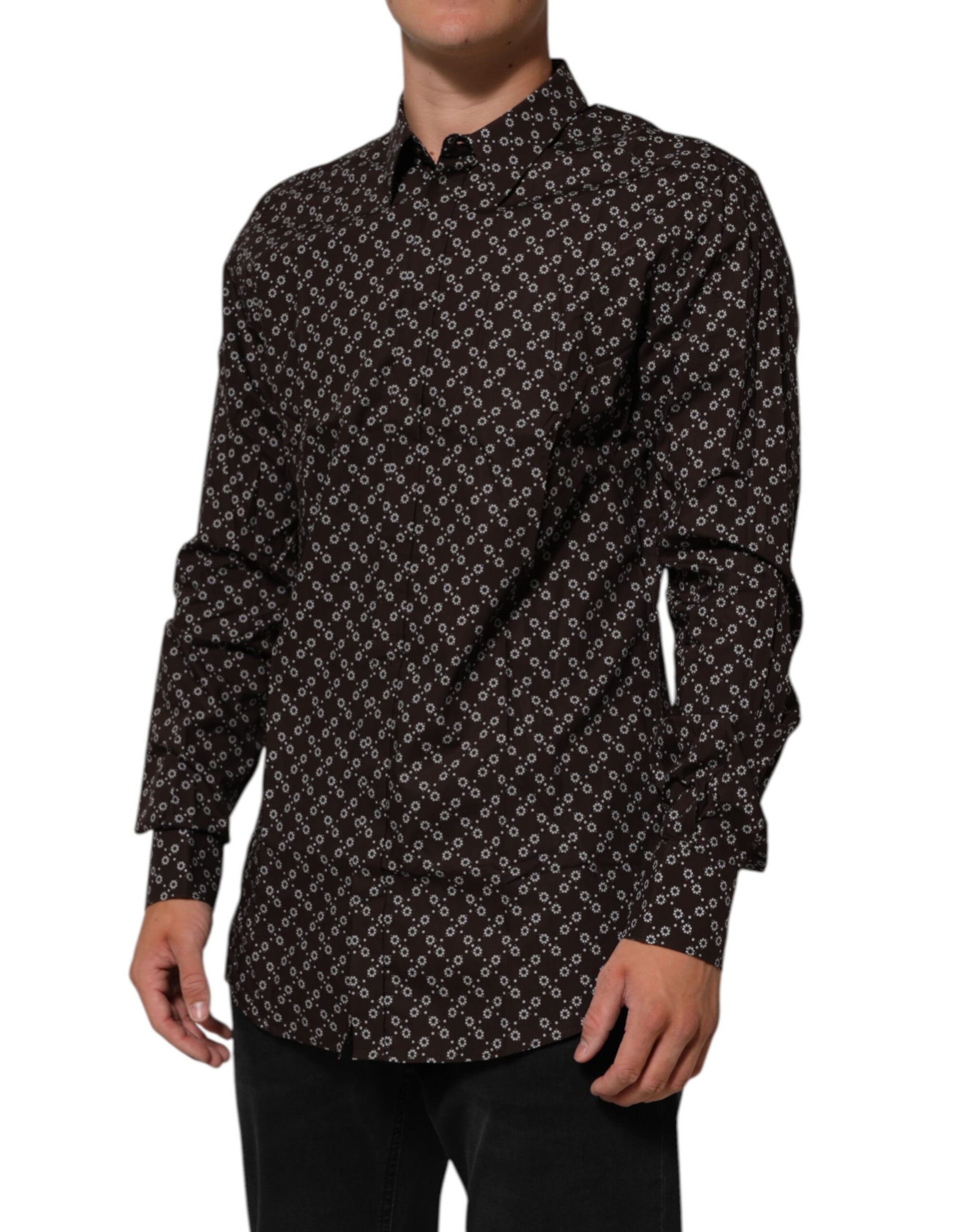 A mannequin wearing a brown floral collared shirt