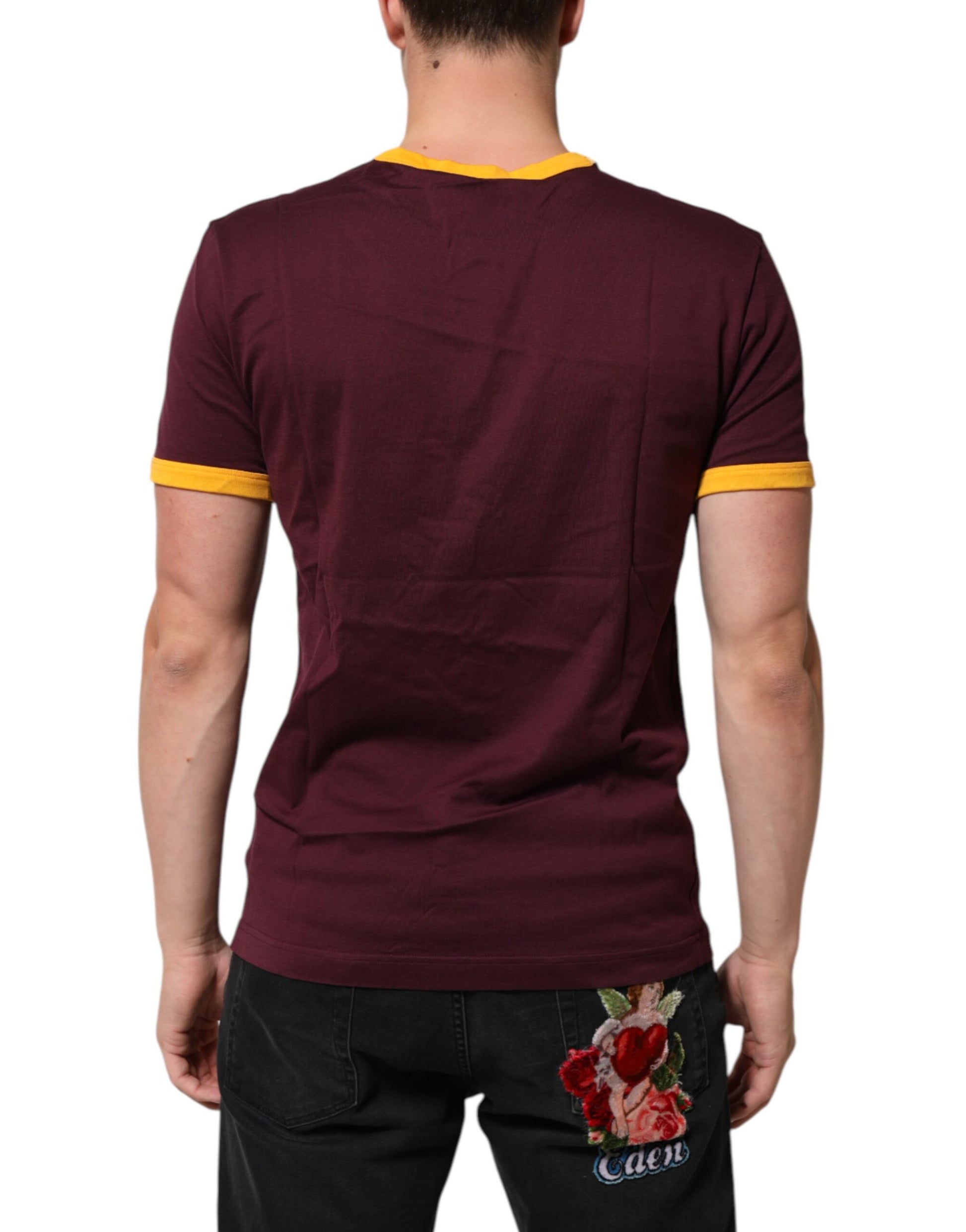 Maroon short sleeve shirt with yellow trim on back