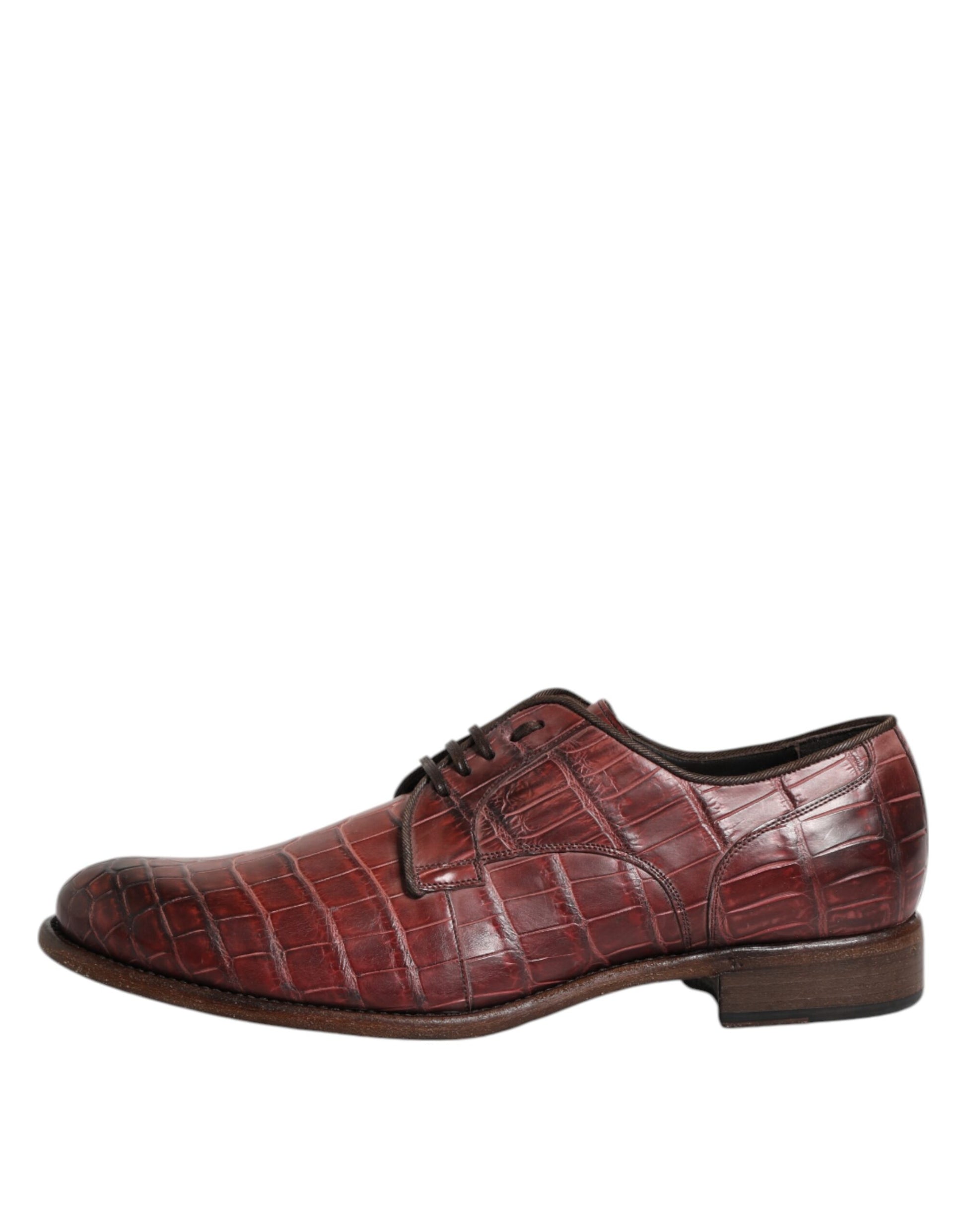 Red leather lace-up dress shoes with brown trim and soles, by Dolce & Gabbana